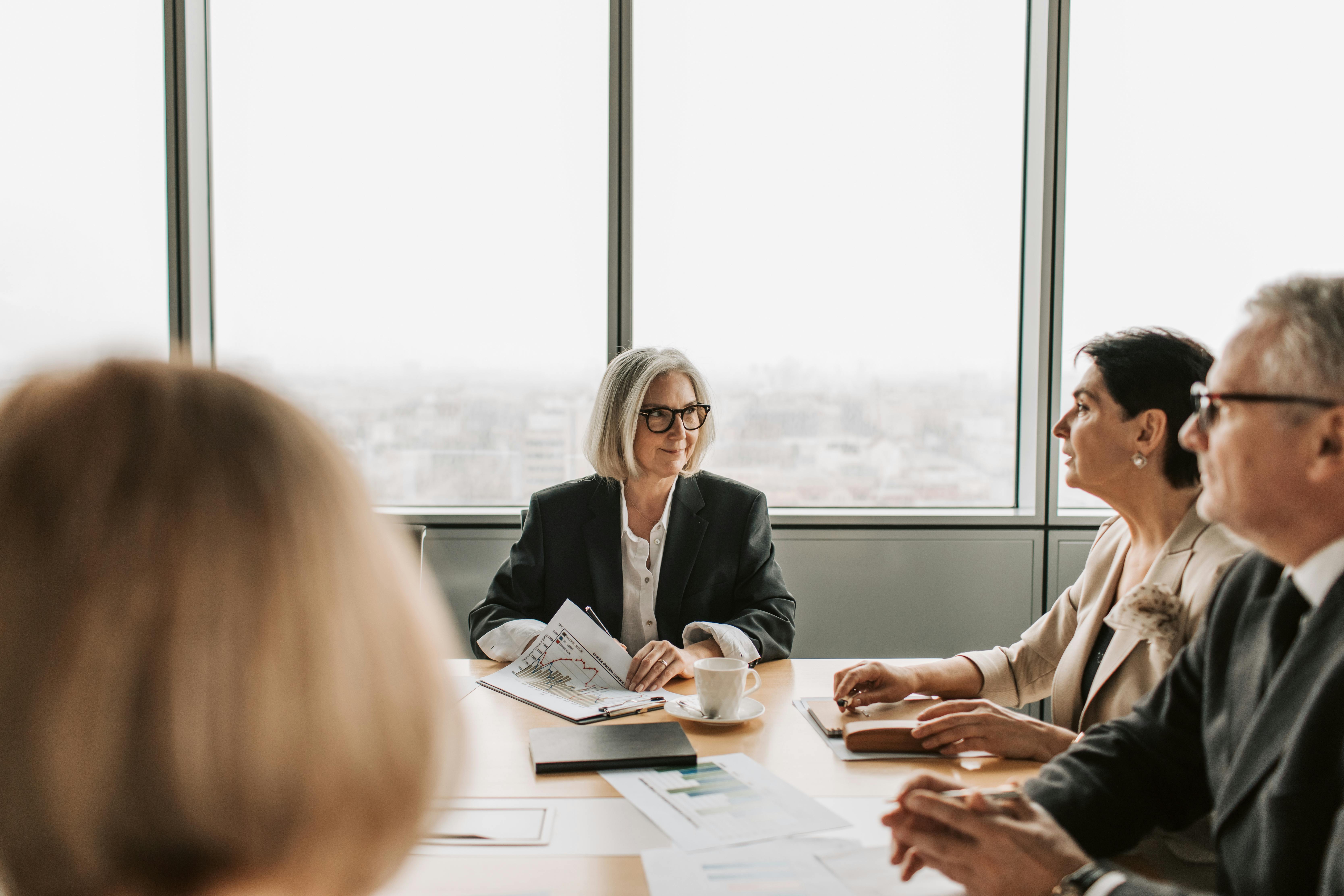 man sitting beside woman looking at a contract on DocuSign
