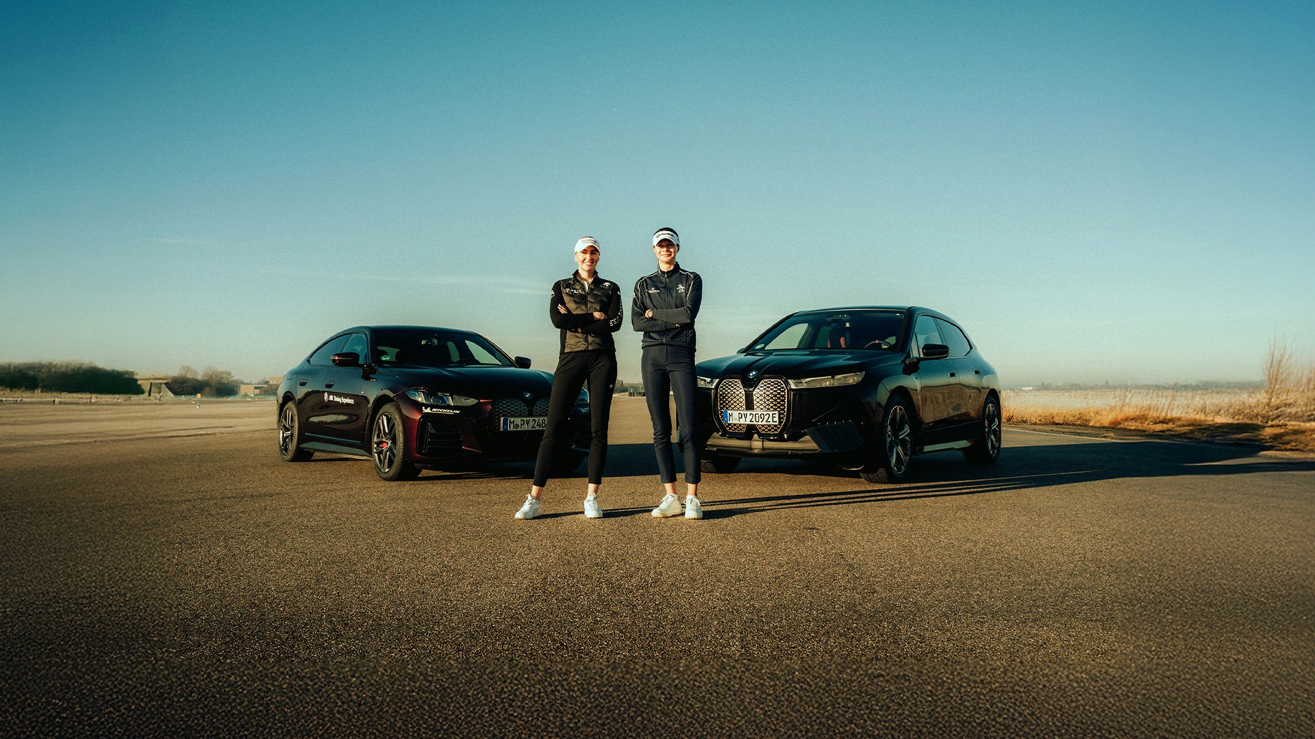 bmw i model on racetrack in munich with olympic winner golfers bmw motors group