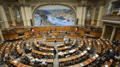 Swiss Federal Assembly discussing policies and legislation related to electromobility and electric vehicle incentives, highlighting political developments influencing the adoption of sustainable transportation in Switzerland