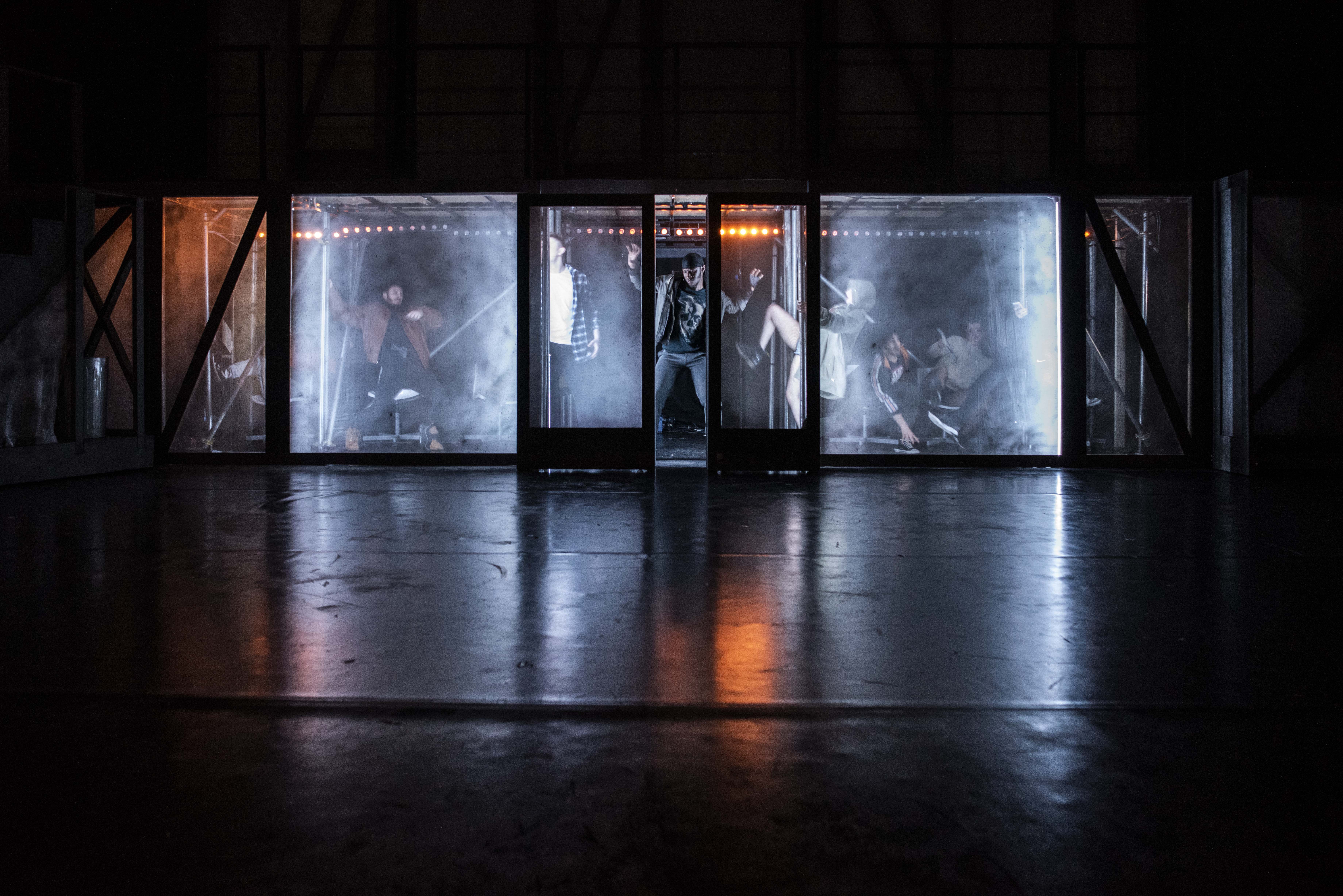 A Theatre play in a dark room with students from Urdang International Classes