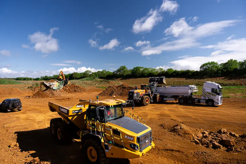 Bell B30E articulated dump truck and plant fleet carrying out large-scale bulk excavation and earthworks on a UK civil engineering project
