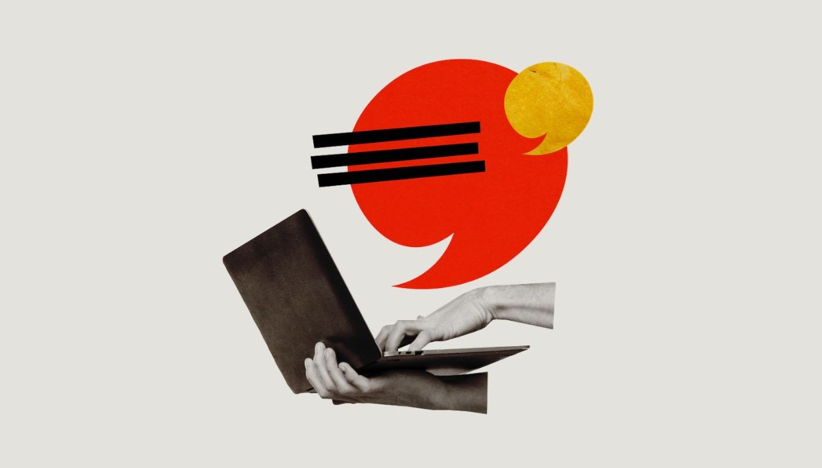 Hands typing on laptop with speech bubble icon, symbolizing nit comments in code review.