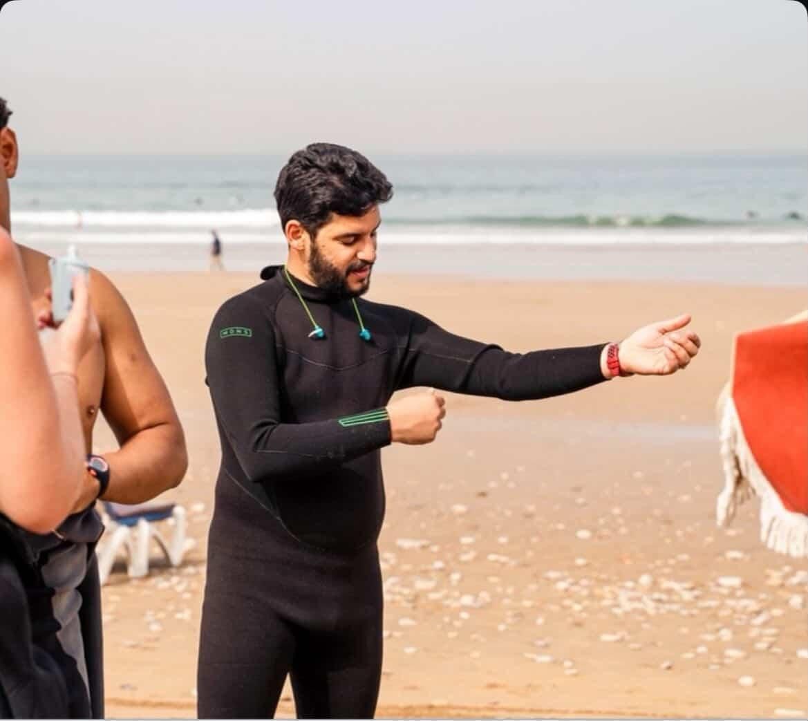 a person holding a surfboard