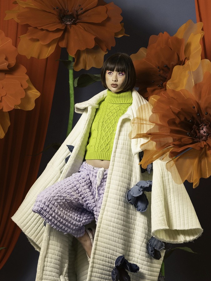 close-up psoing for a picture in a colorful background