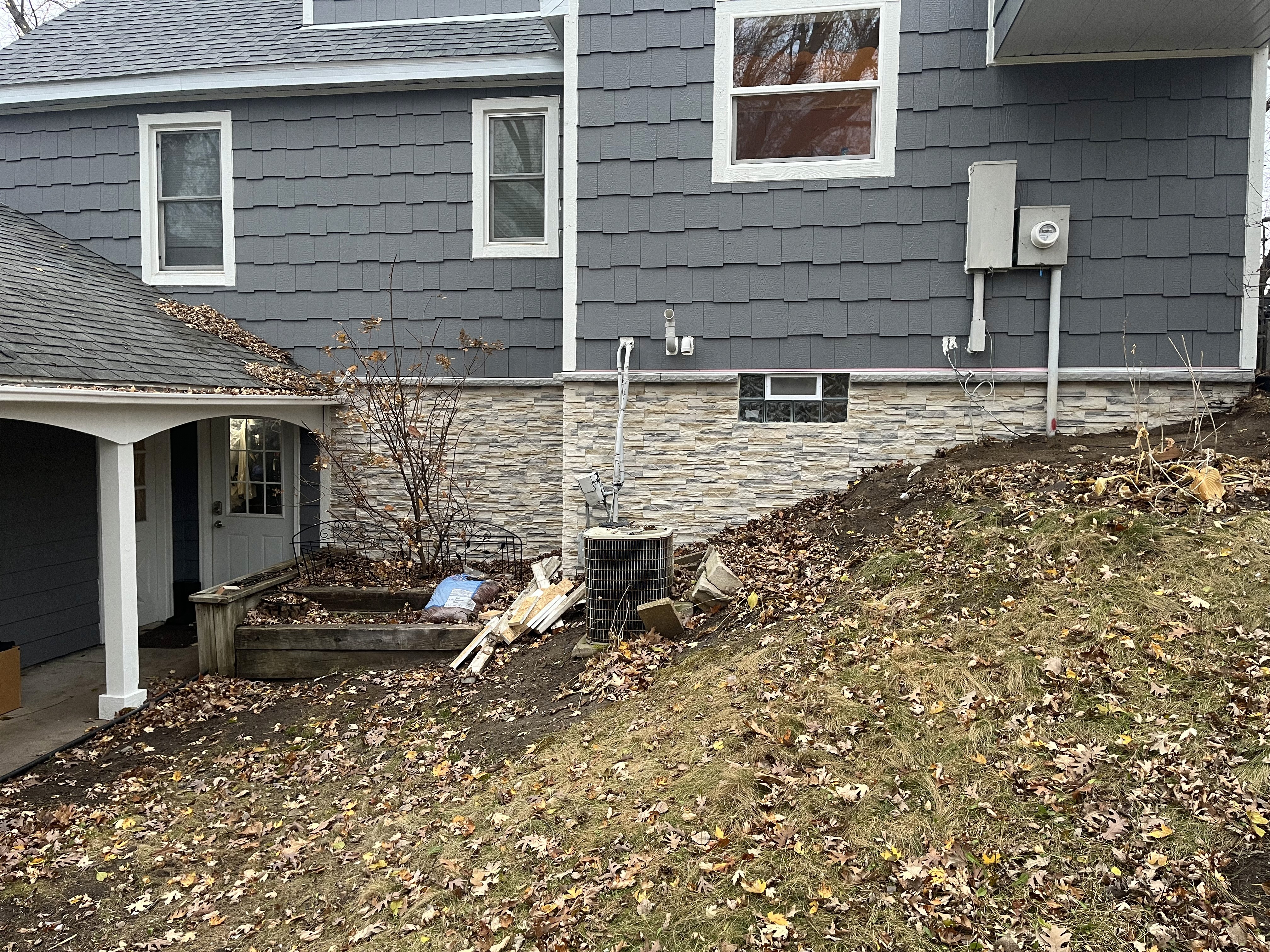 Back of house with dover gray lp shakes