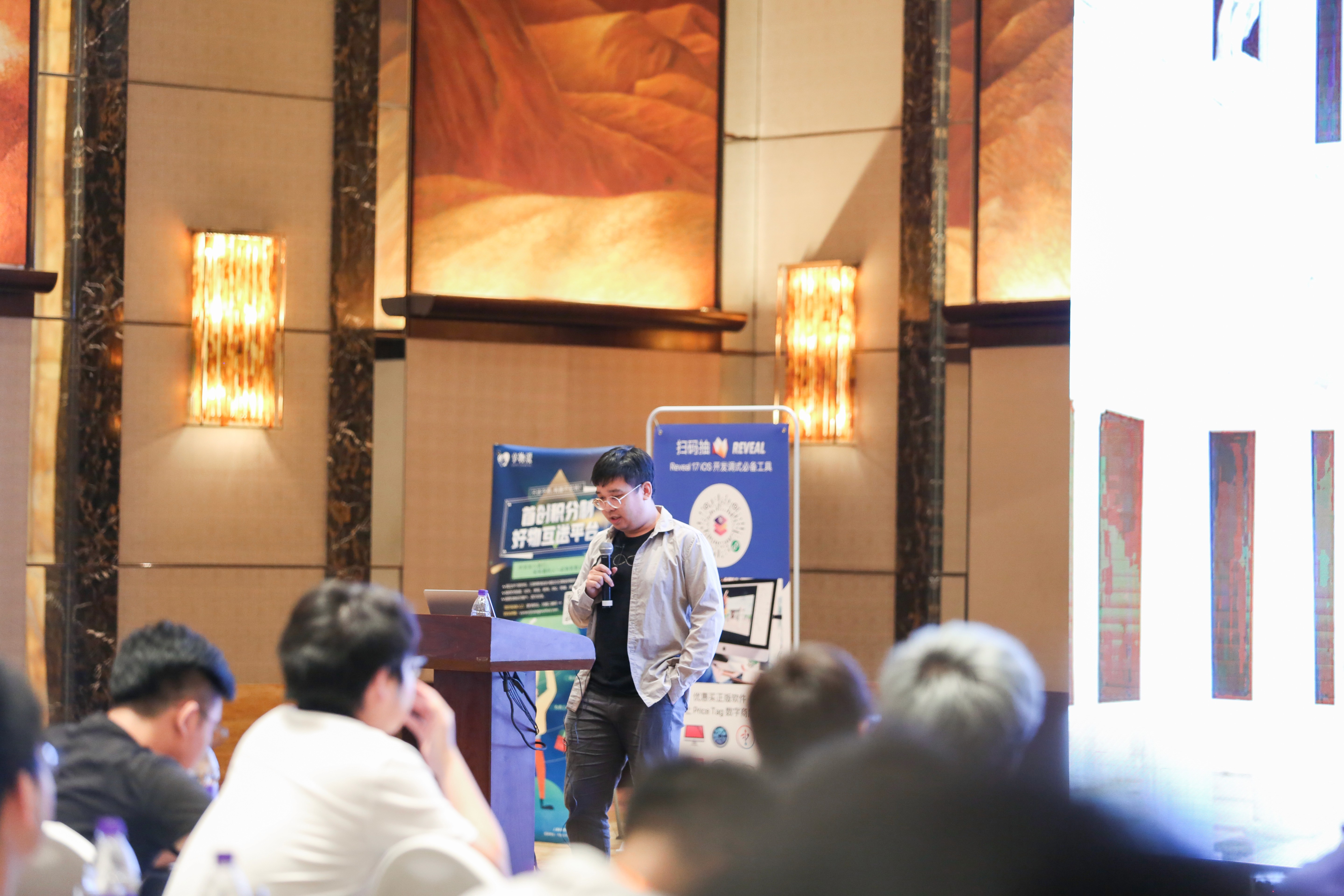 a man holding a microphone in his hands