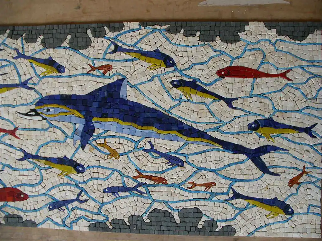 Vibrant mosaic of colorful fish in an underwater scene.