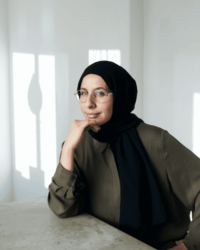 Profile portrait of a man in a grey shirt