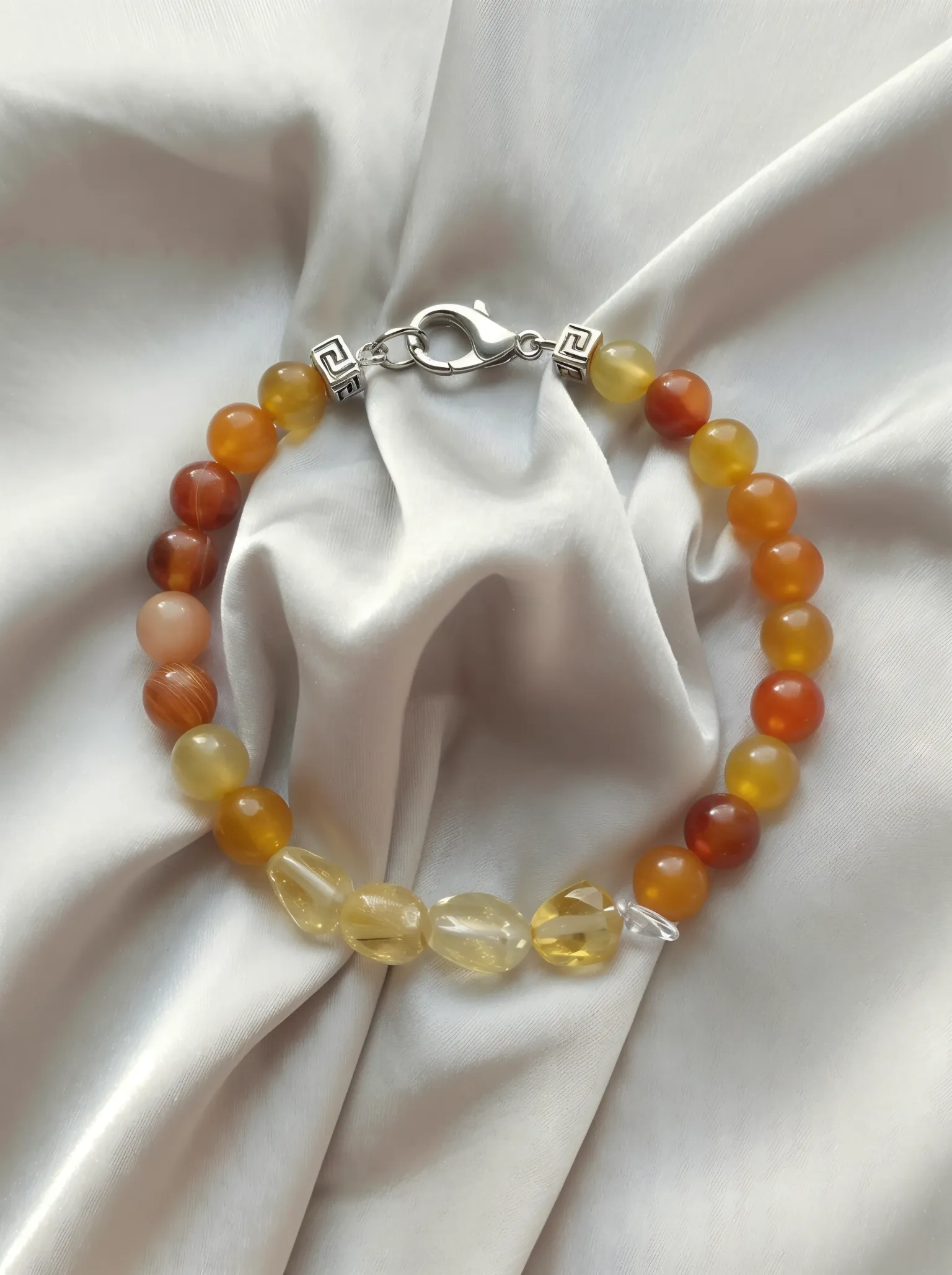 Bracelet placed on a fabric setting.