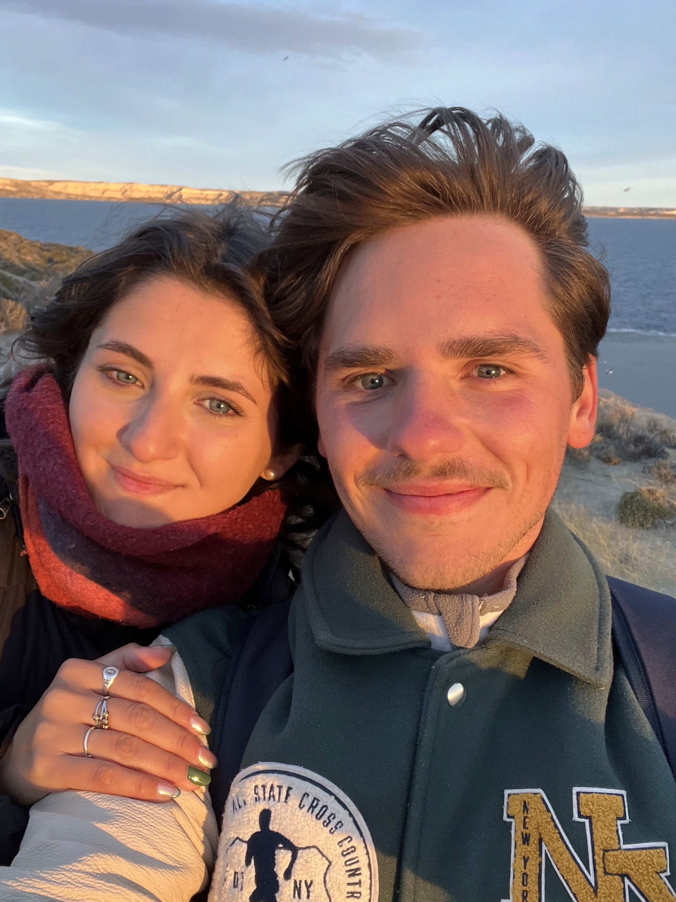 Dog sitting on gravel path
