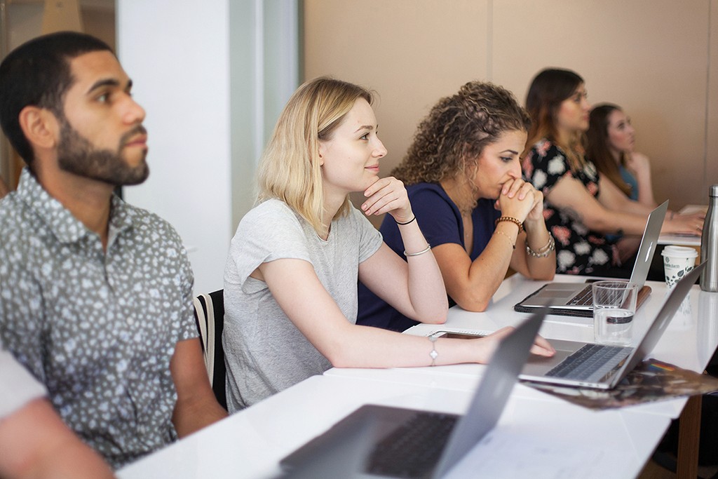 A candid shot of a practitioner mid-session, signaling active thinking and open exchange.