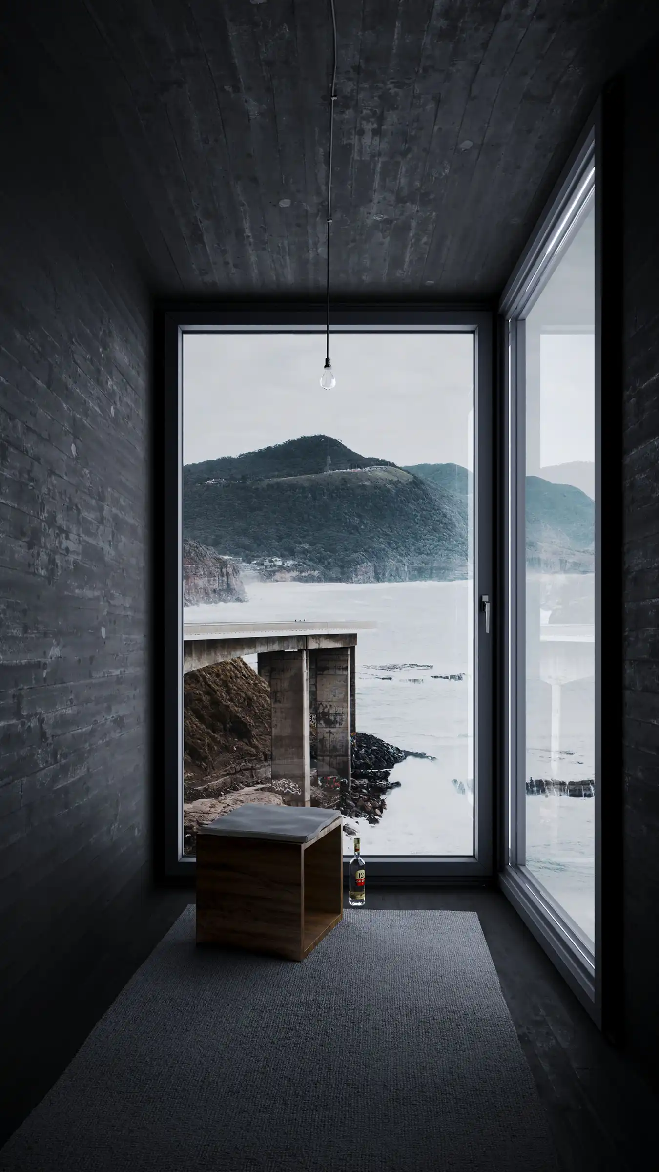 Minimalist concrete room with large panoramic window overlooking dramatic coastal landscape, wooden stool, and bottle. Contemplative architectural interior.