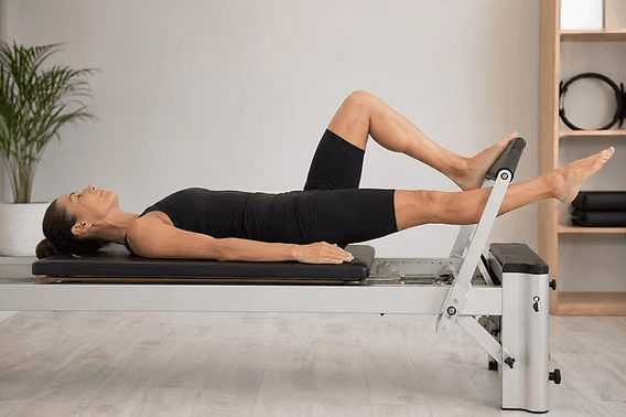 Pilates Reformer Leg Exercises - single balance footbar press