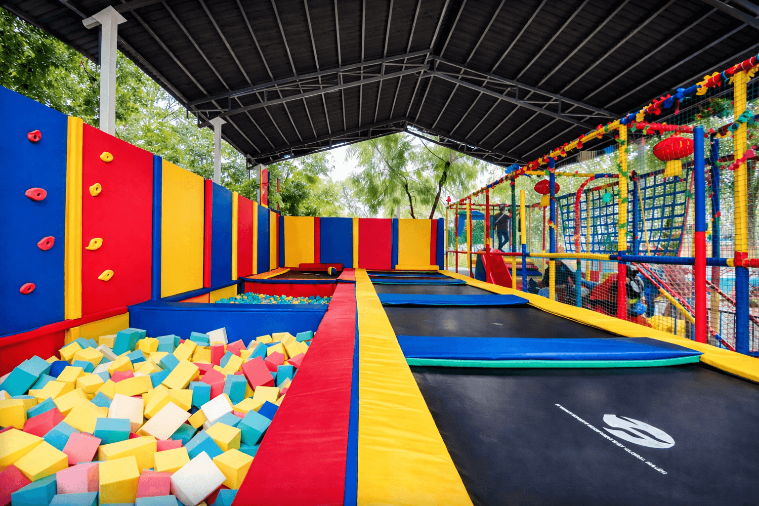 Sunlit modern living room with orange chair, plant.