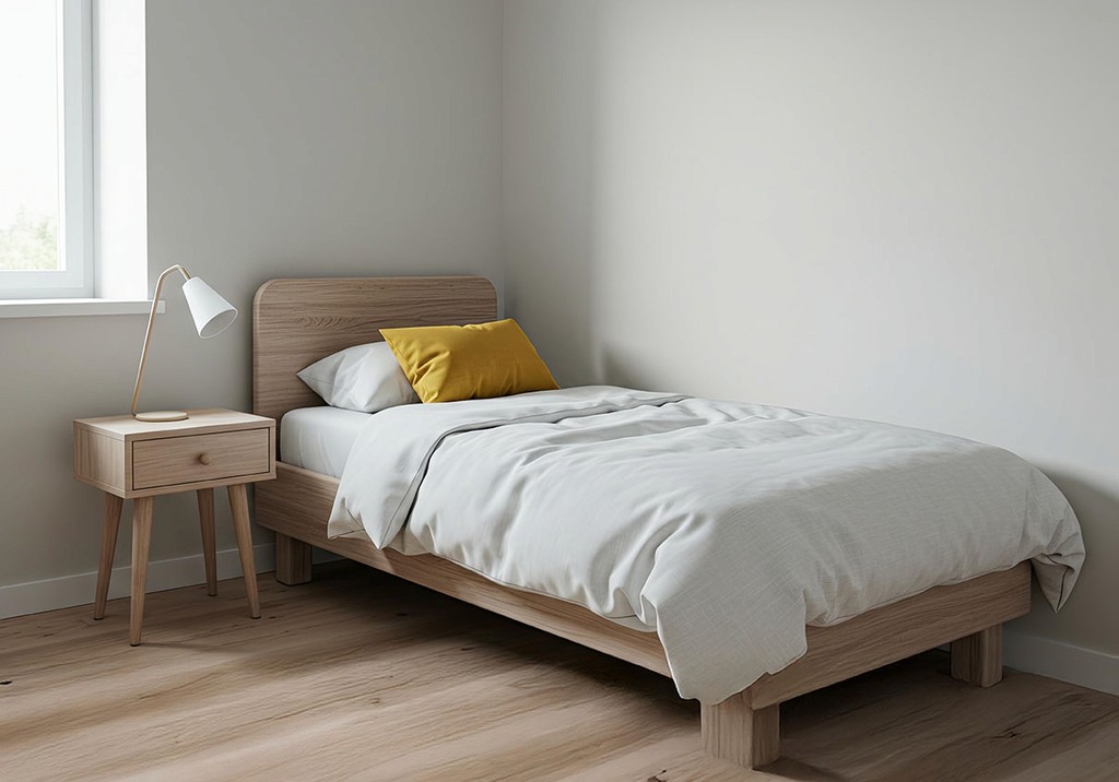 	Neat single bedroom and side table, representing APAP's night shelter