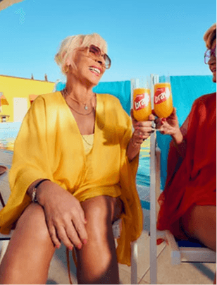 Smiling woman in yellow at a pop-up party on a boat
