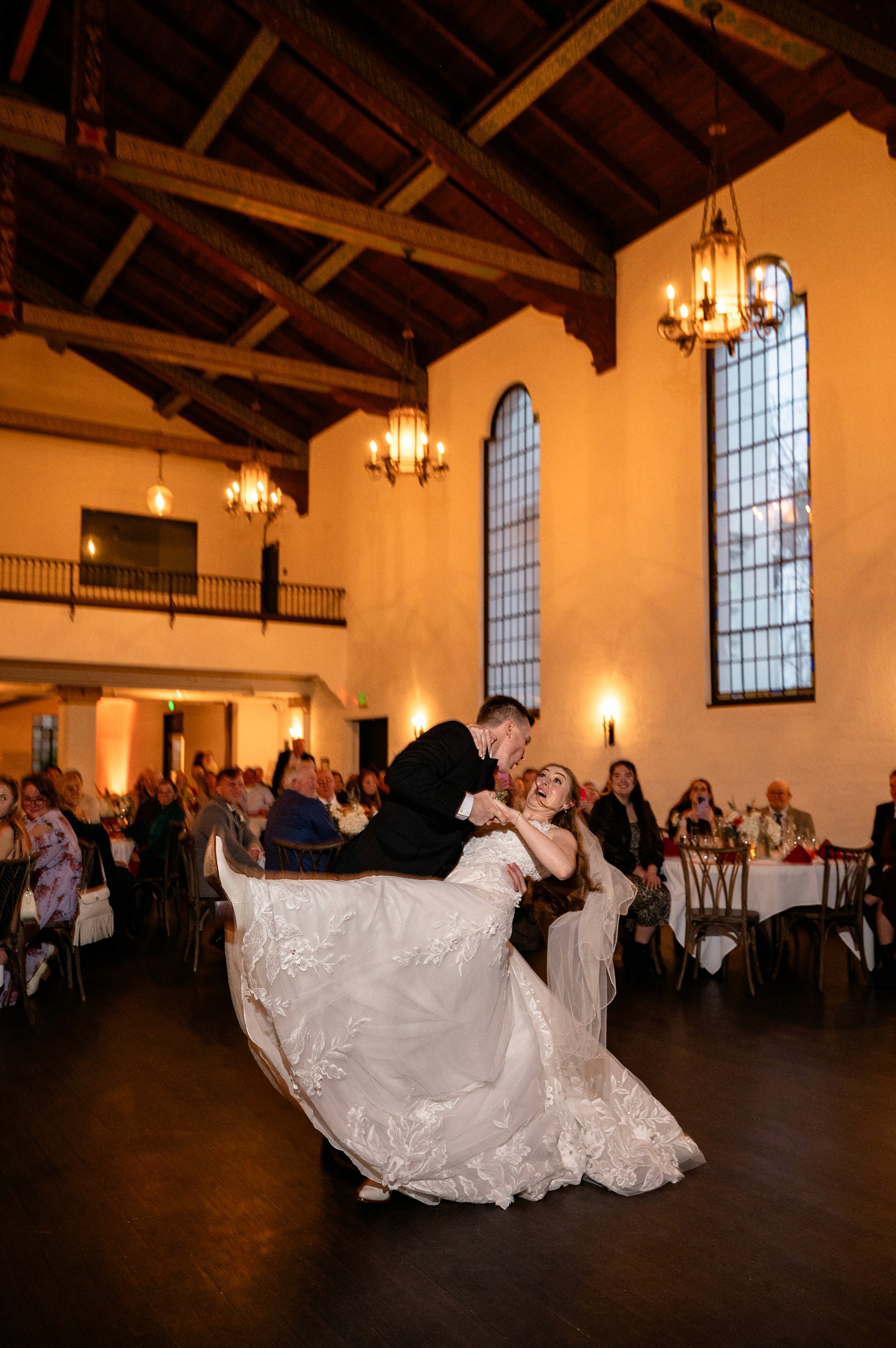 Flat lay wedding details with bouquet, rings, and sparkling bridal heels
