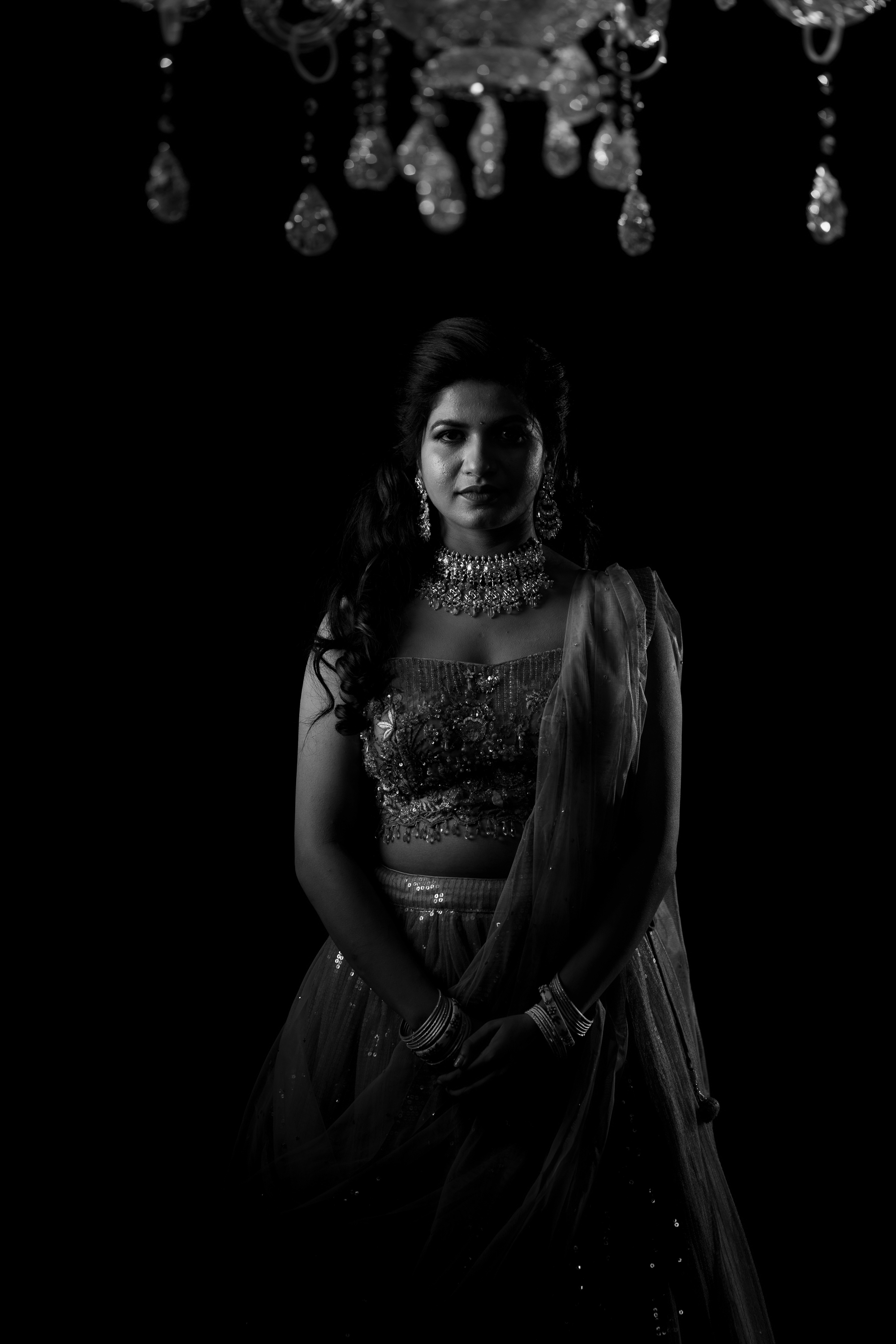 Stunning black & white portrait of Mounika, exuding elegance. Captured by Out of The Blues Fine Art Wedding Photography in Hyderabad.