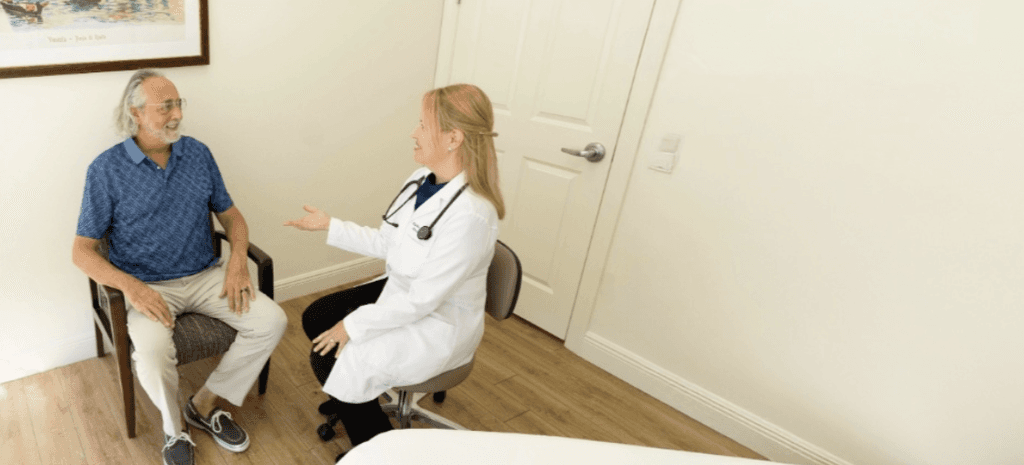 Dr. Migdalia Merida meeting with a concierge medicine member at Harper Health Sarasota.