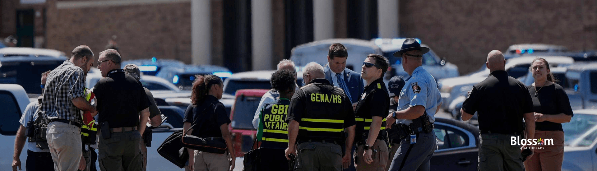 Law enforcement officers in Georgia gather outside a school following a deadly shooting incident.