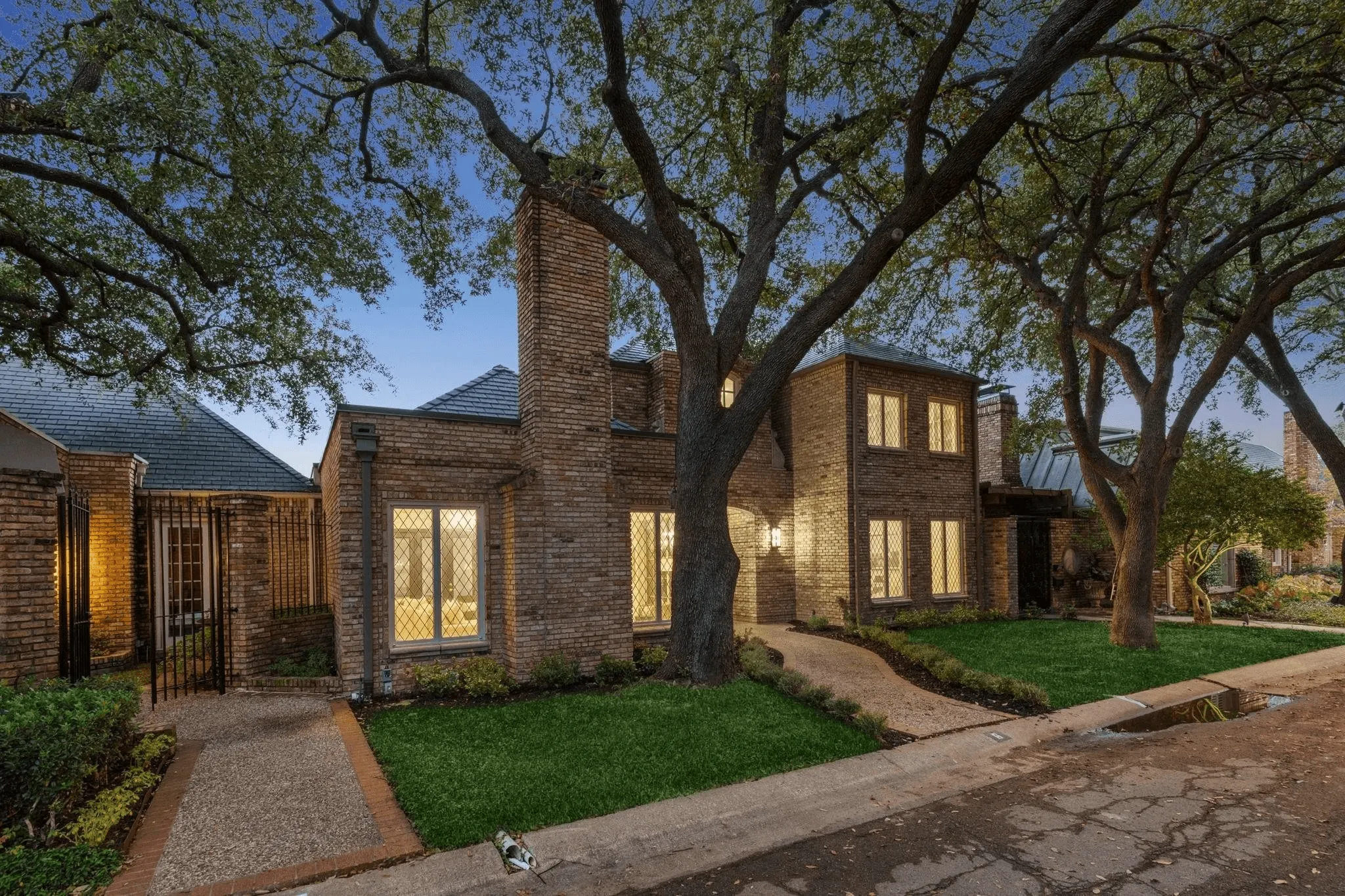 Completed Dallas roof restoration aerial view Oak Cliff 75214 showing premium synthetic slate system