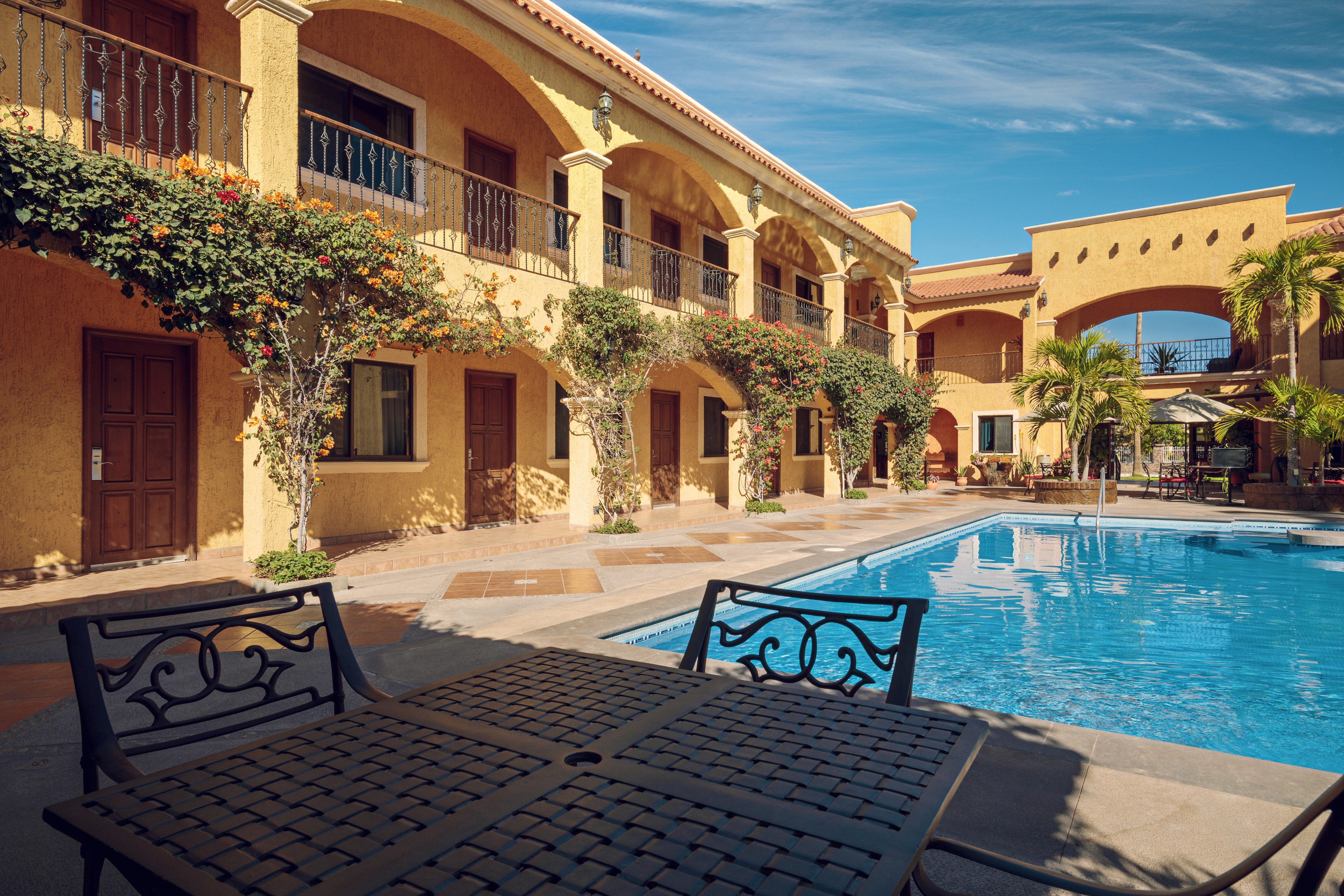 A resort with pool and blue sky