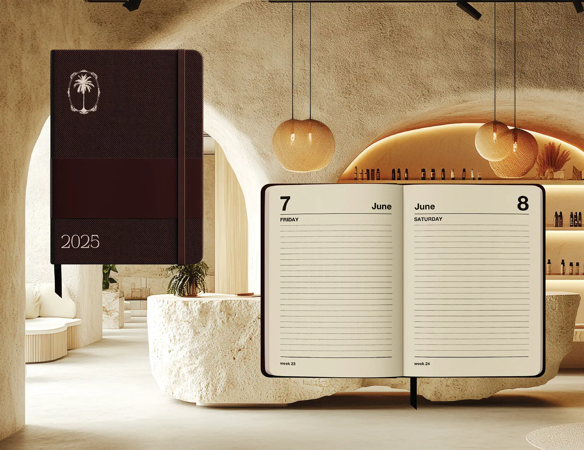 Brand collateral design for Eterna Studio interior design showing branded notebook and planner in luxury interior setting