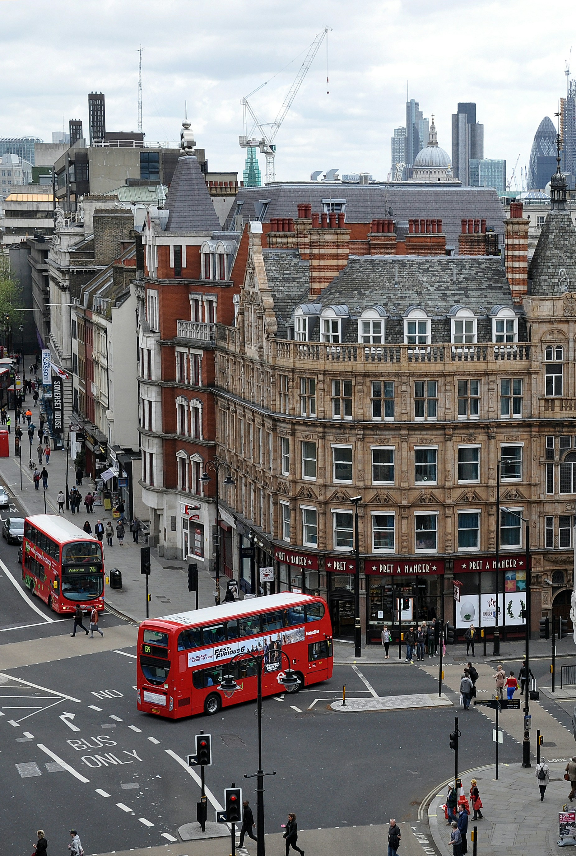 Street view of London with classic buildings and a red double-decker bus, representing Three Experience Design’s work in the United Kingdom.