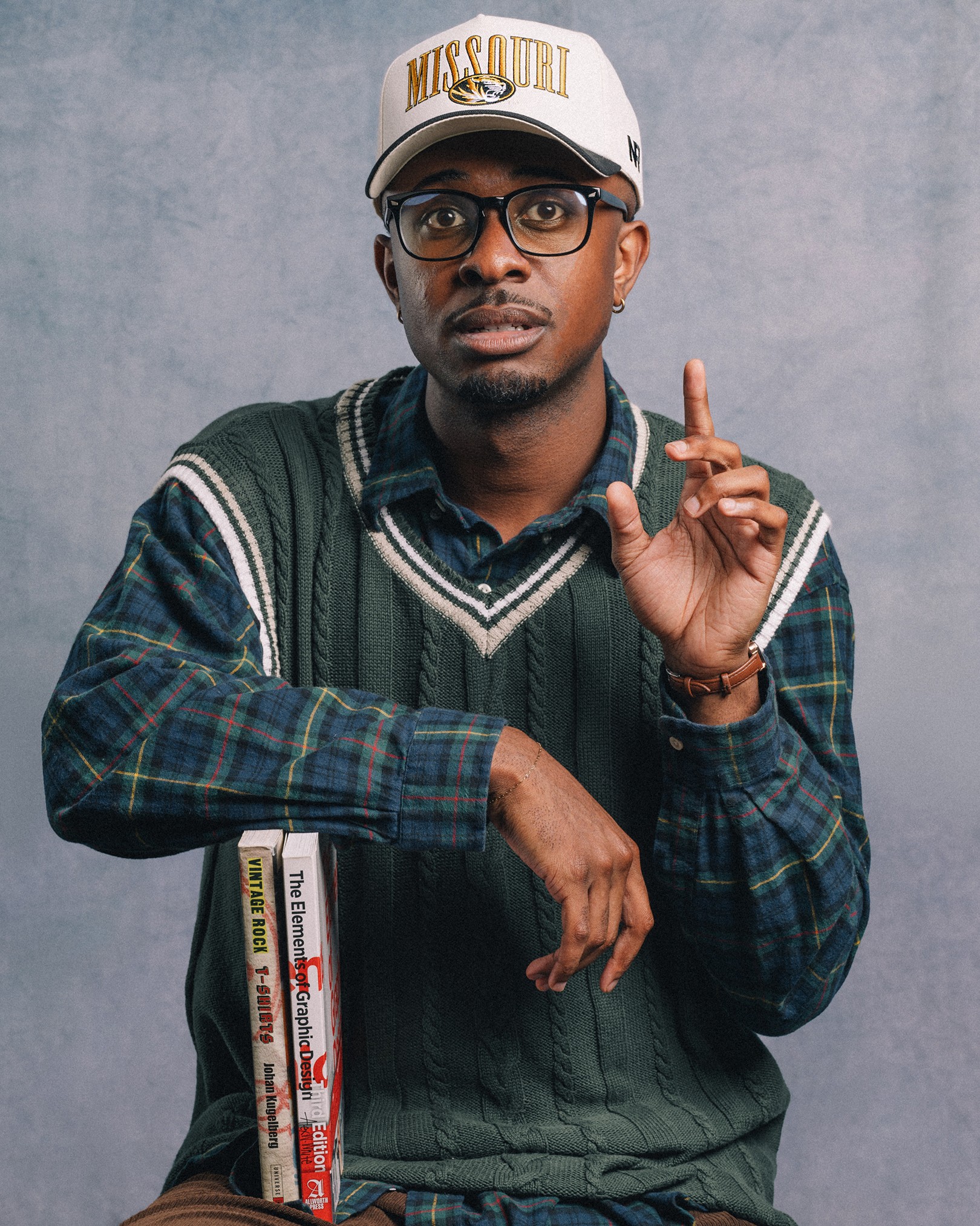 Streetside billboard with flyposters of the Batch.Works brand and illustrations