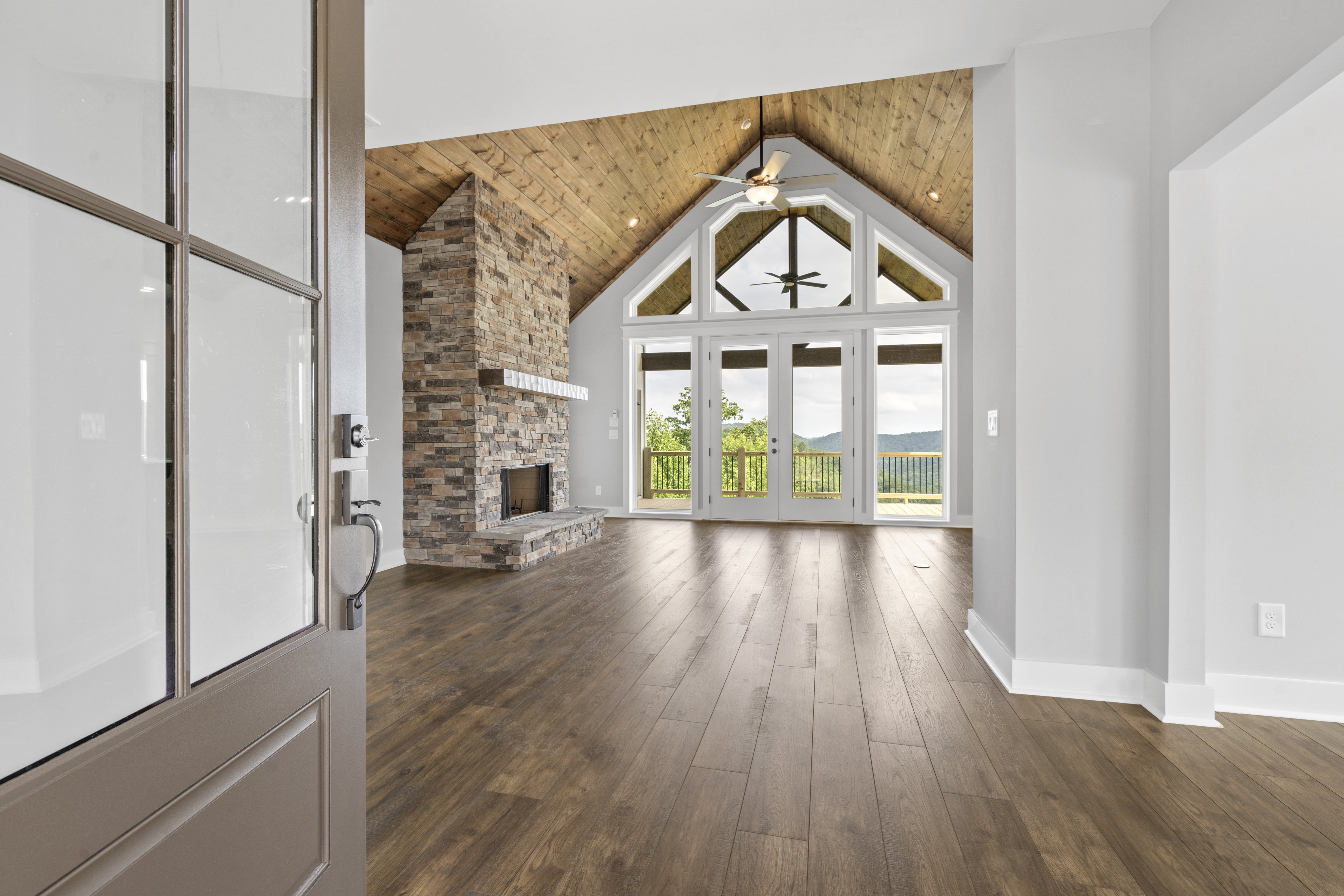 Spacious covered porch with scenic mountain view and luxurious finishings