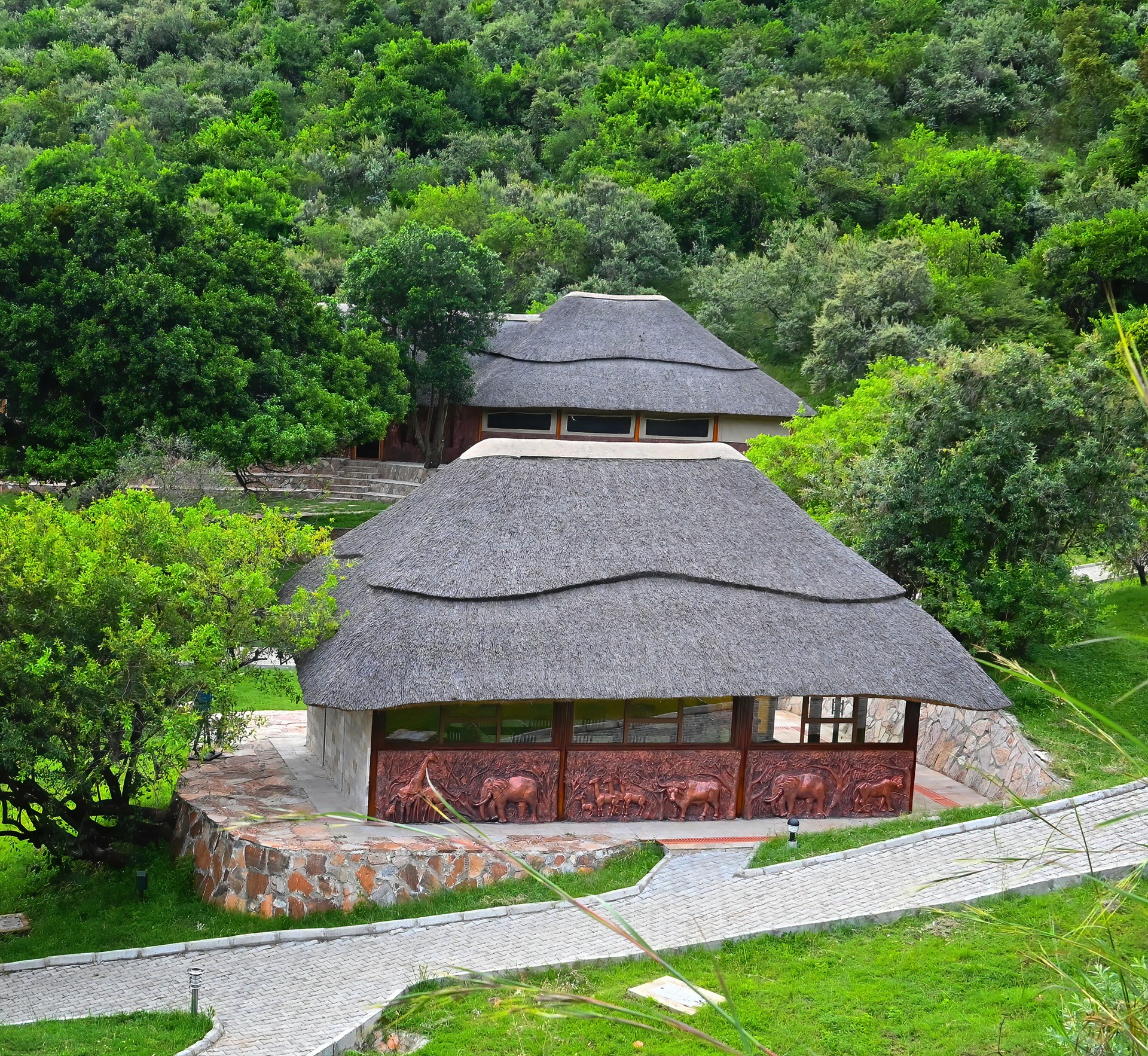 Main lodge exterior among trees
