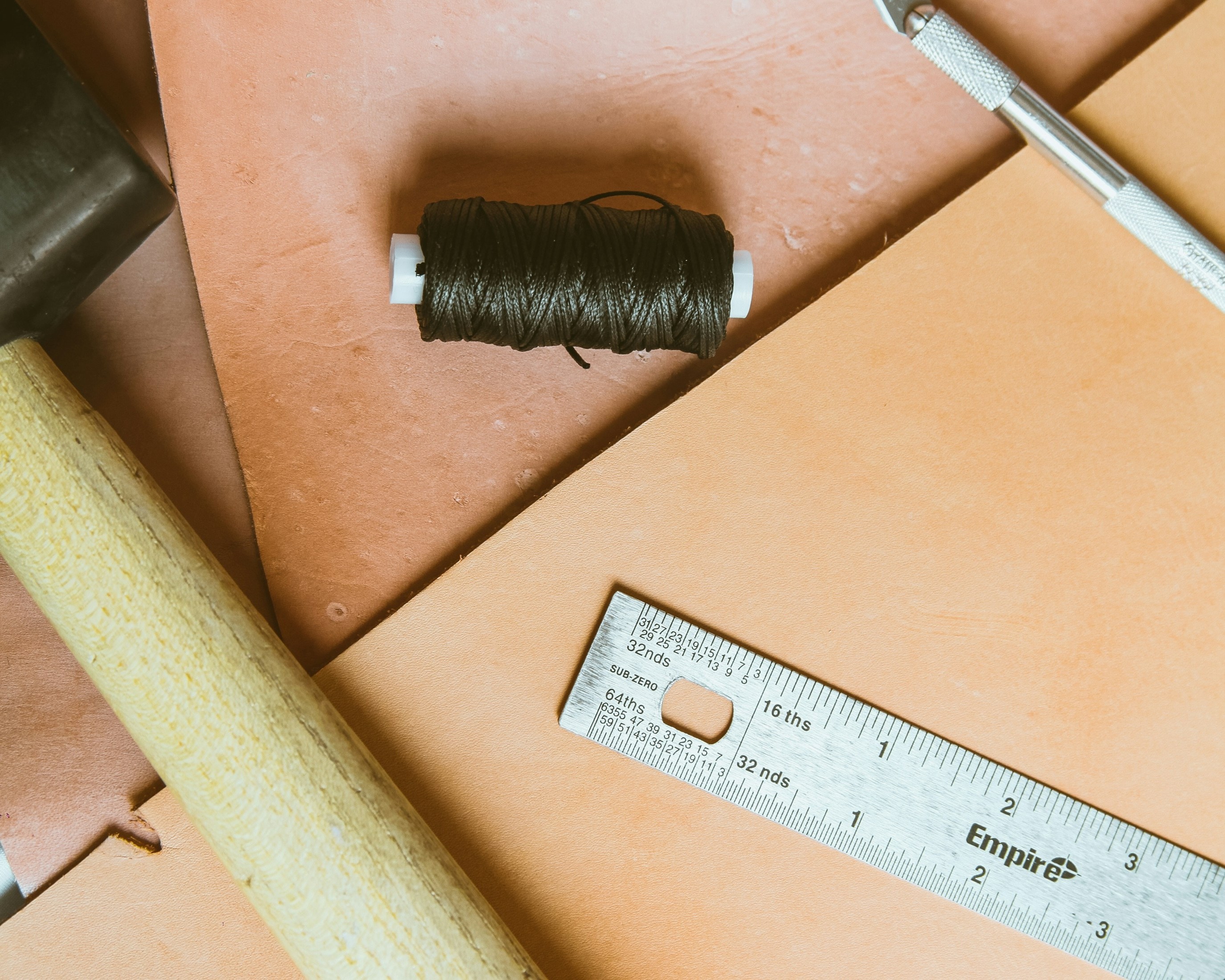 A scene of two ladies unfolding a floor mat