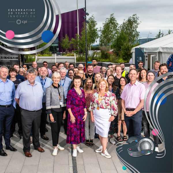 A group photo of CPI staff at one of CPI's 20th anniversary roadshows.