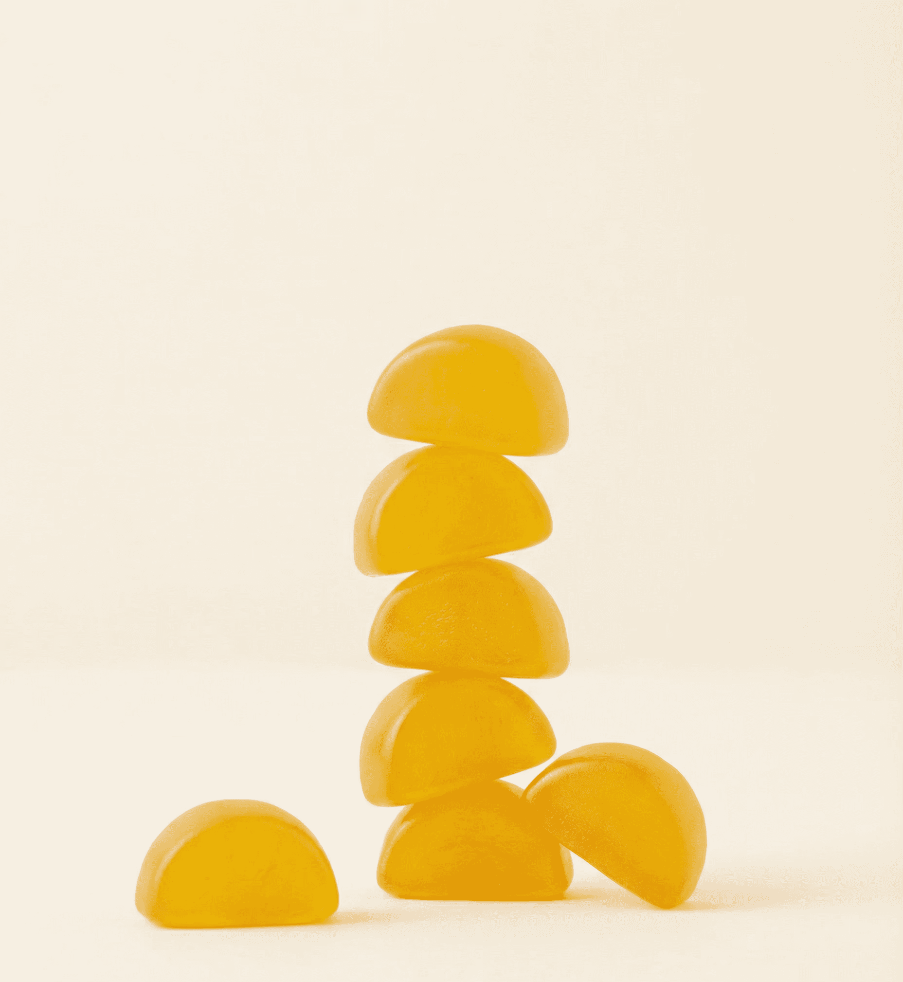 Orange gummies stacked on top of each other