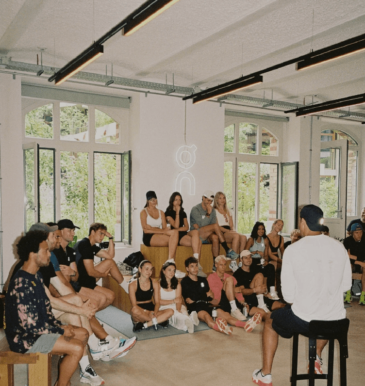 a woman in a dress sitting on a couch