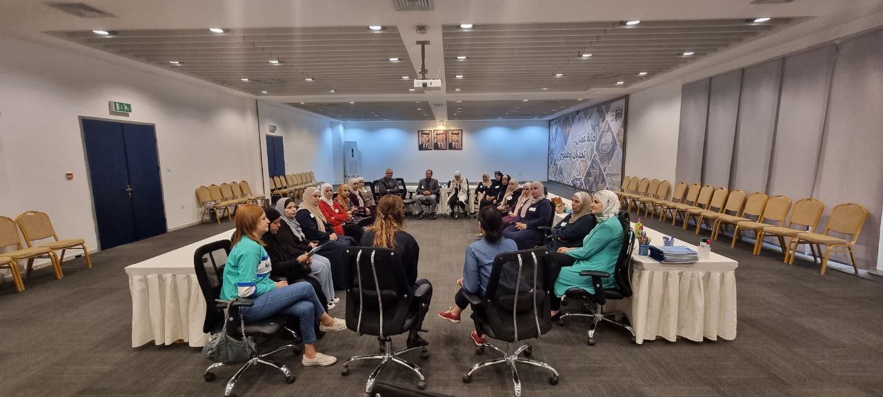 five children smiling while doing peace hand sign