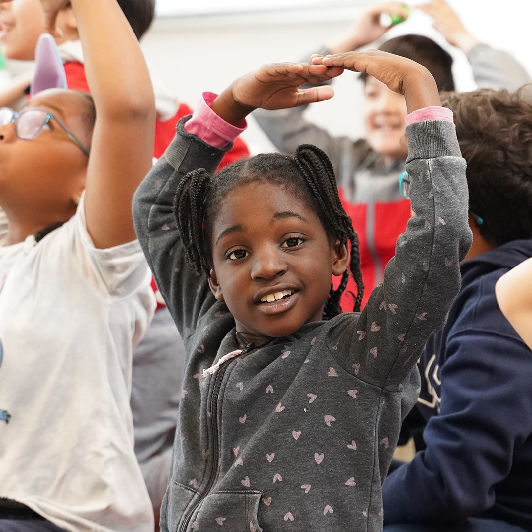 Students participating in interactive improv games during after school theater enrichment program