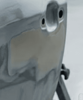 white ceramic bathtub near white framed window