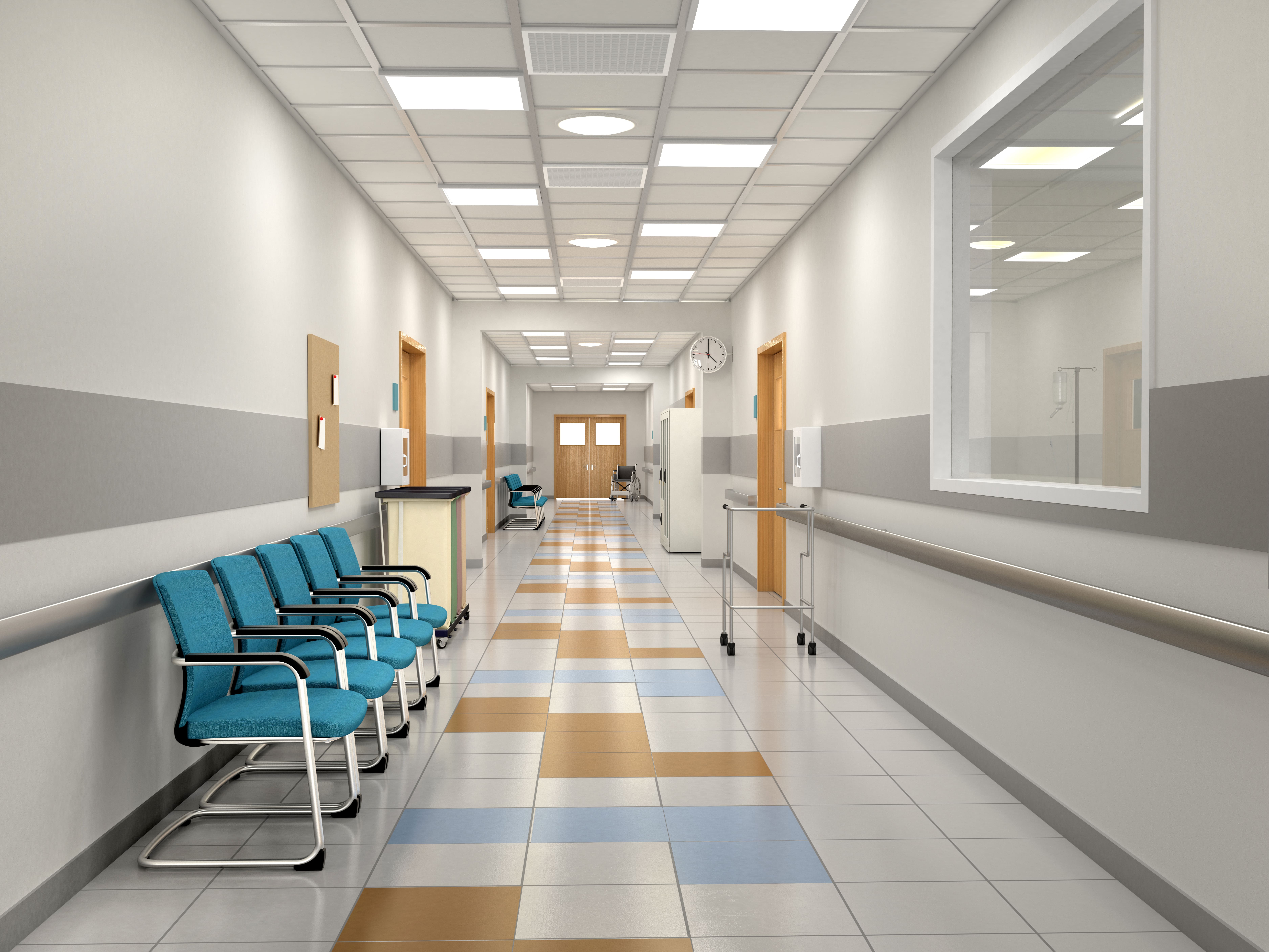 NHS healthcare corridor refurbishment with treatment rooms, waiting seating and clinical finishes