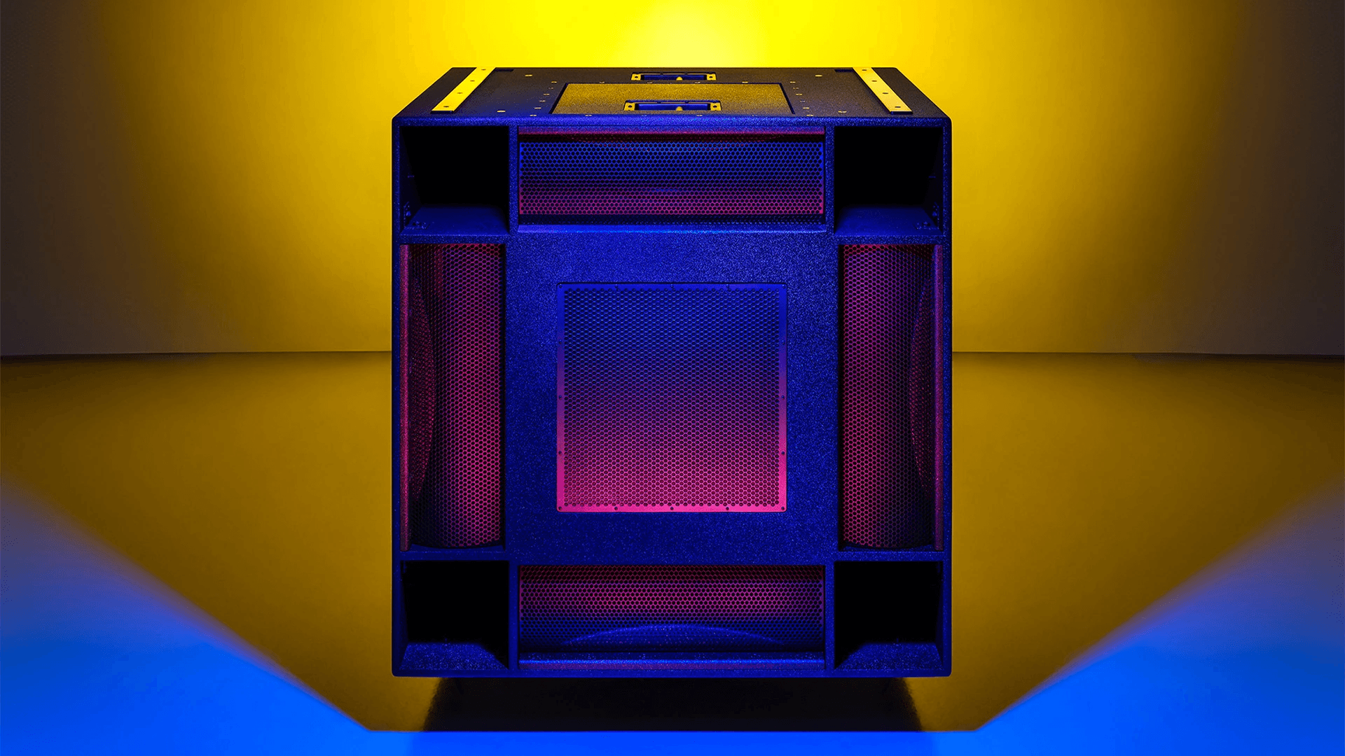 Large black speaker with purple and blue lighting
