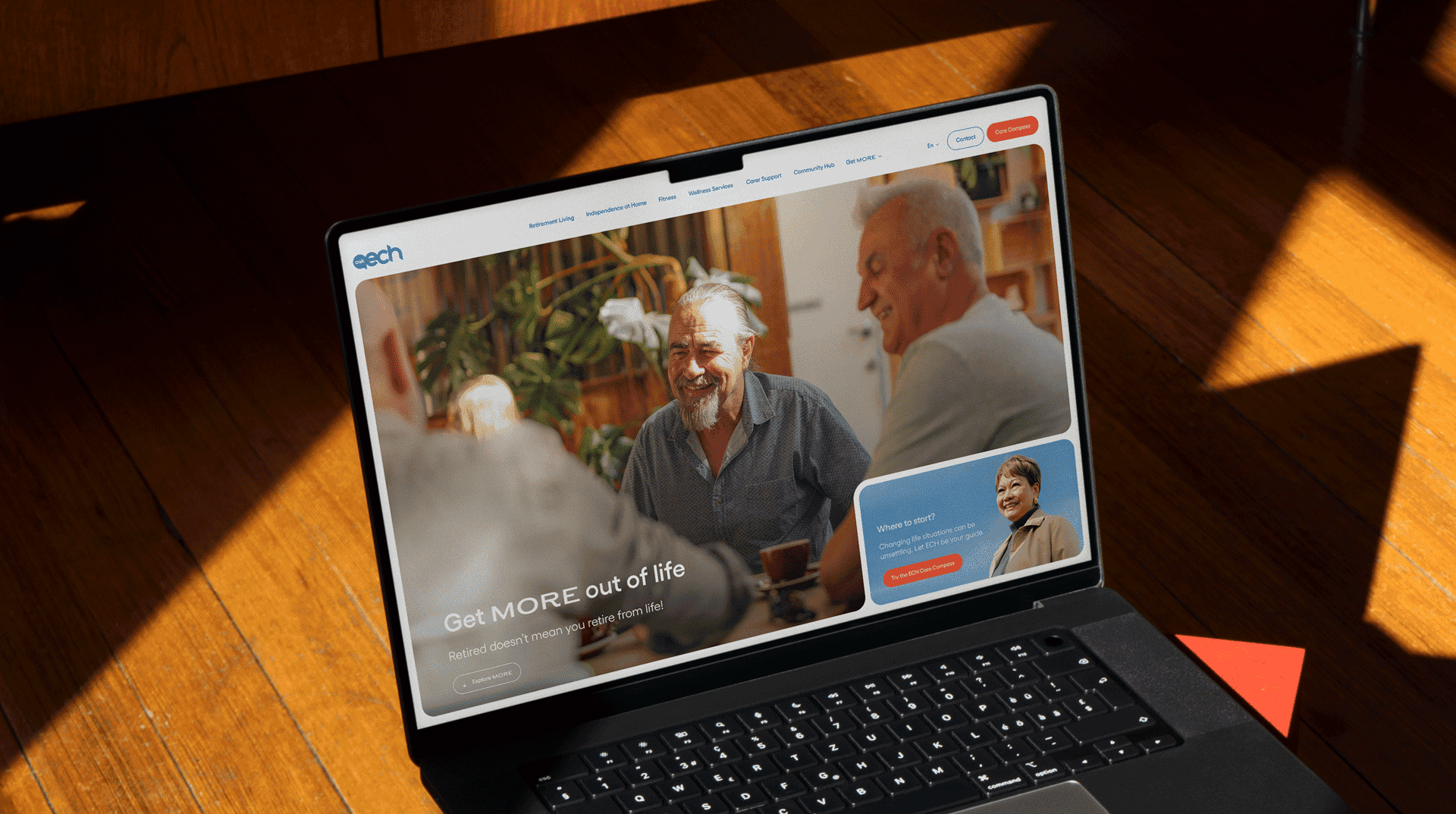 The 'ECH' Website displayed on a laptop sitting on a bench.