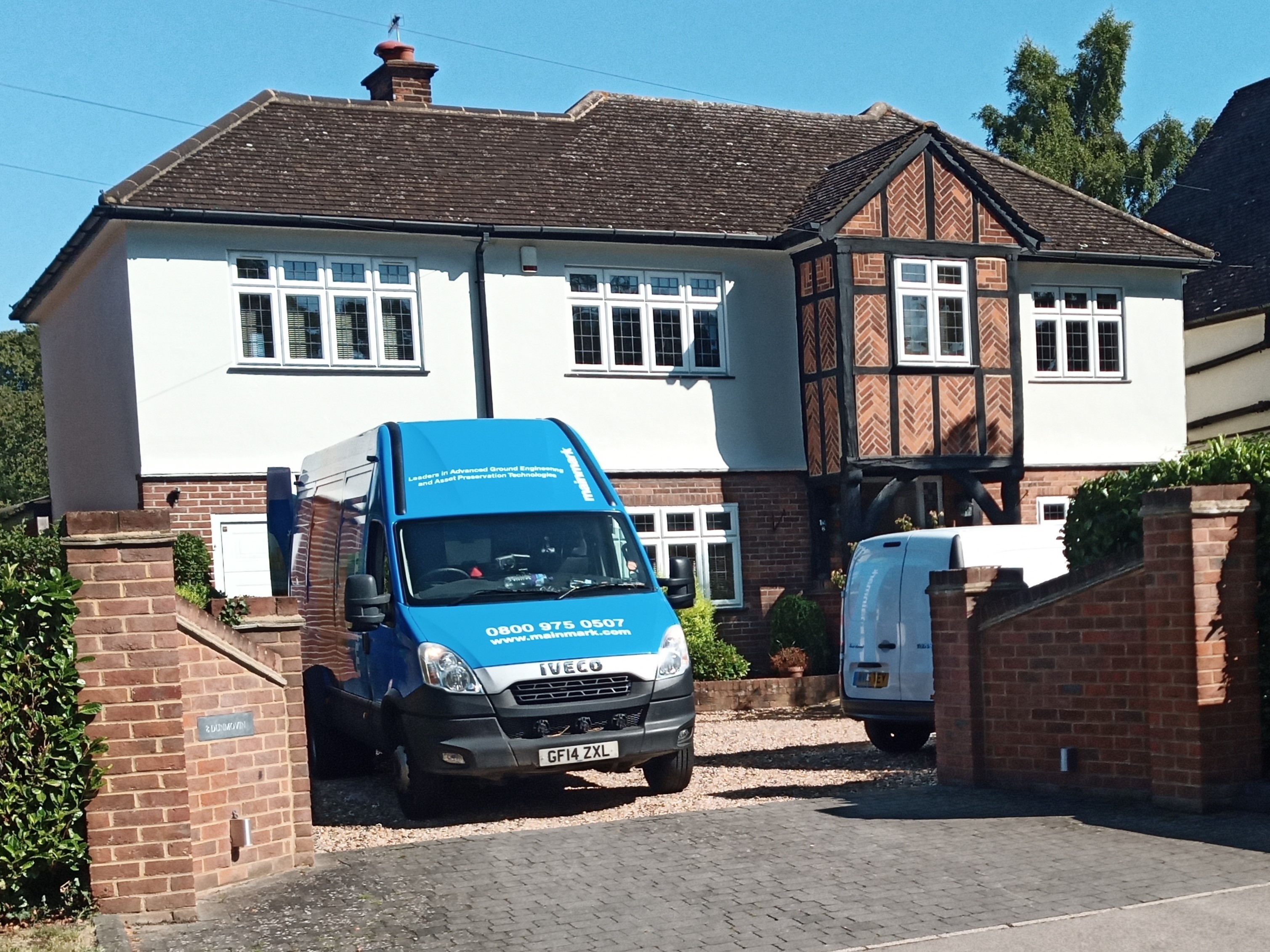 The Mainmark team at a property, underpinning a house