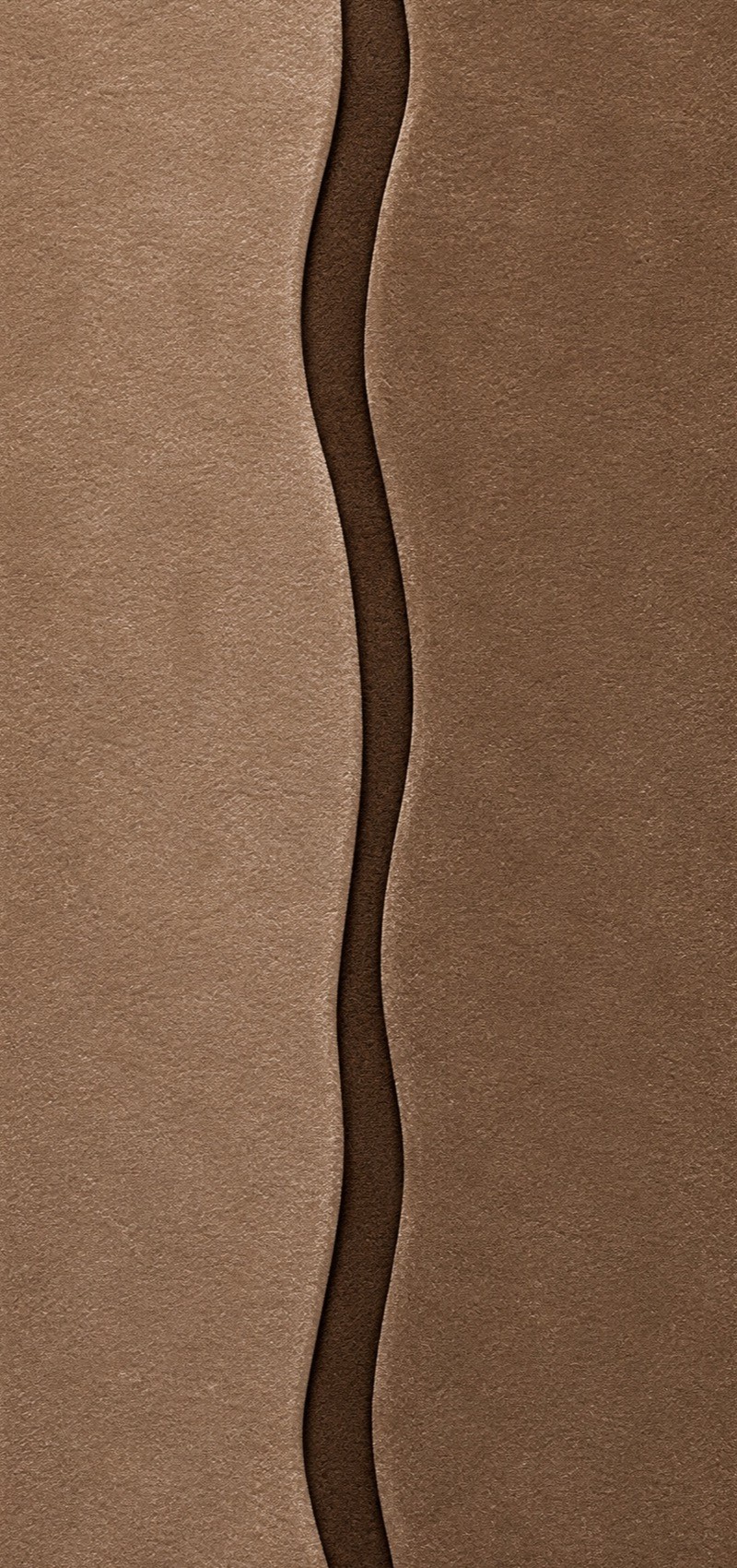 Wave rug in bronze wool with a dark recessed channel