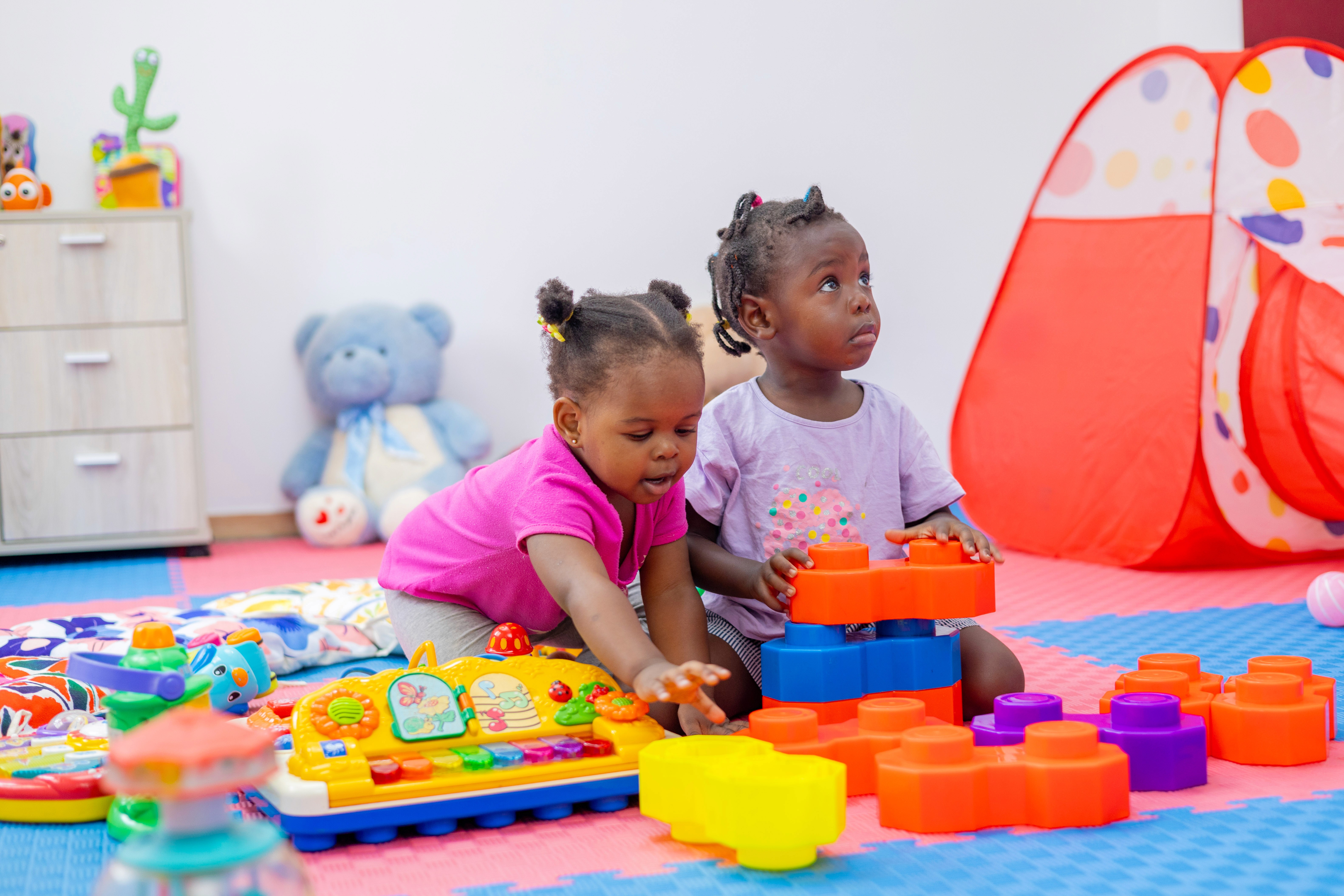 A student is working on a tablet, focused on the screen