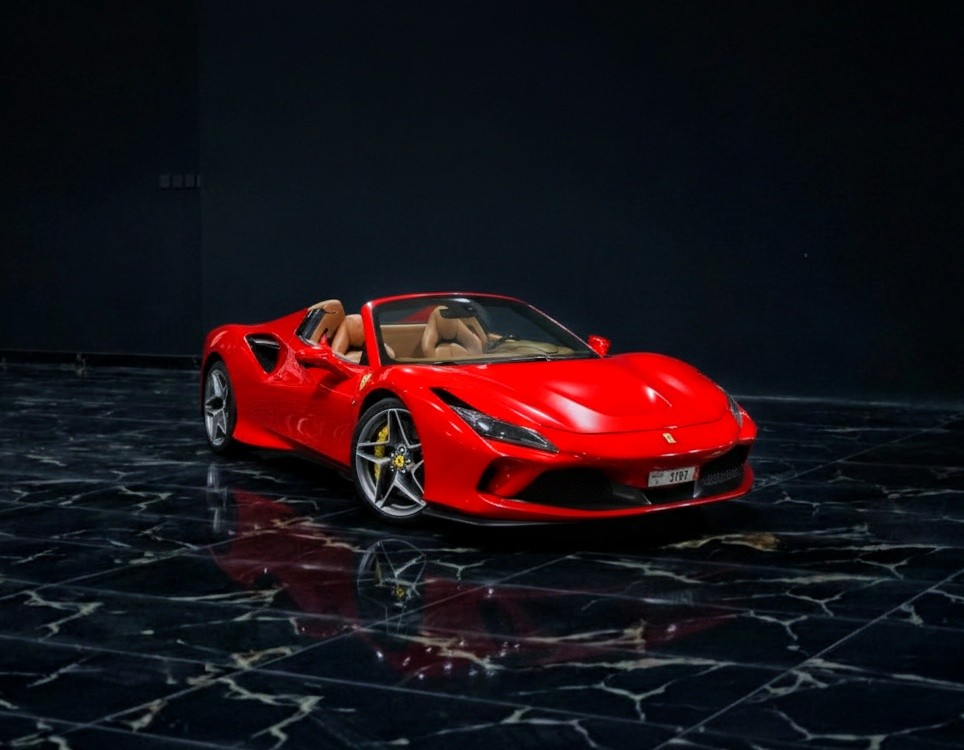 Ferrari F8 Spider 2023 front exterior in showroom, luxury supercar available for rent in Dubai