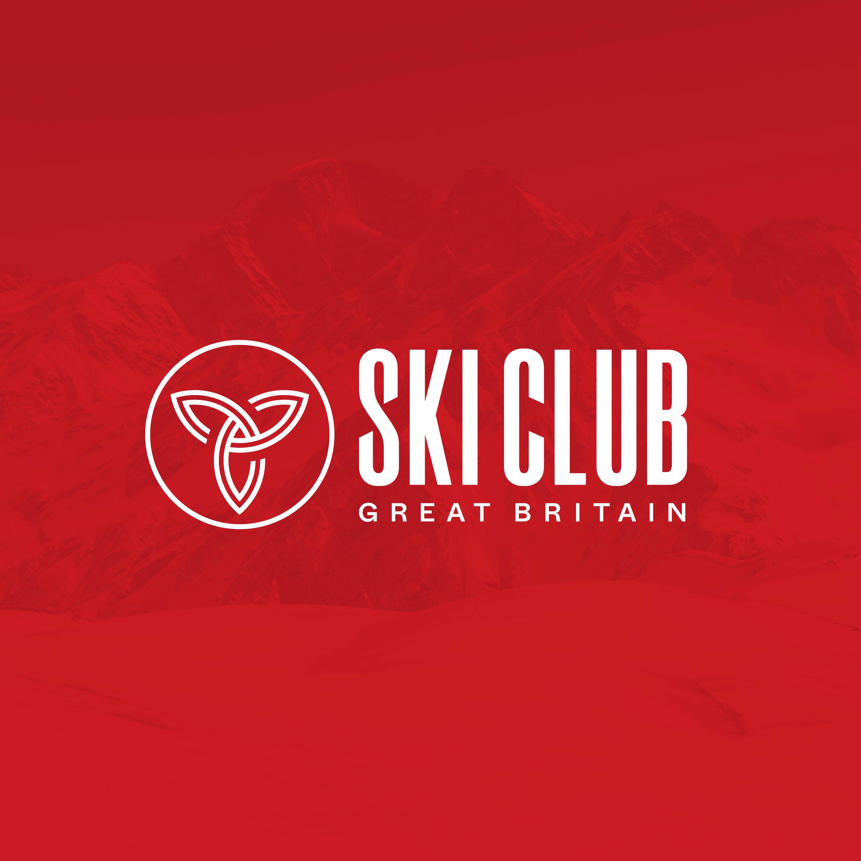 Ski Club Great Britain logo with trefoil emblem and bold wordmark over a red, snow-covered mountain background.