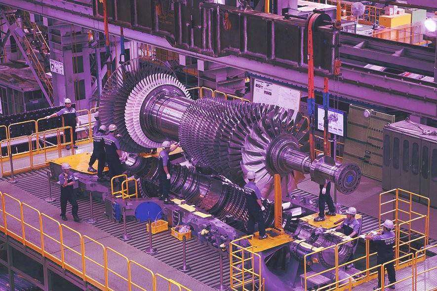 A mockup for a Macbook place on a table for a hair salon website