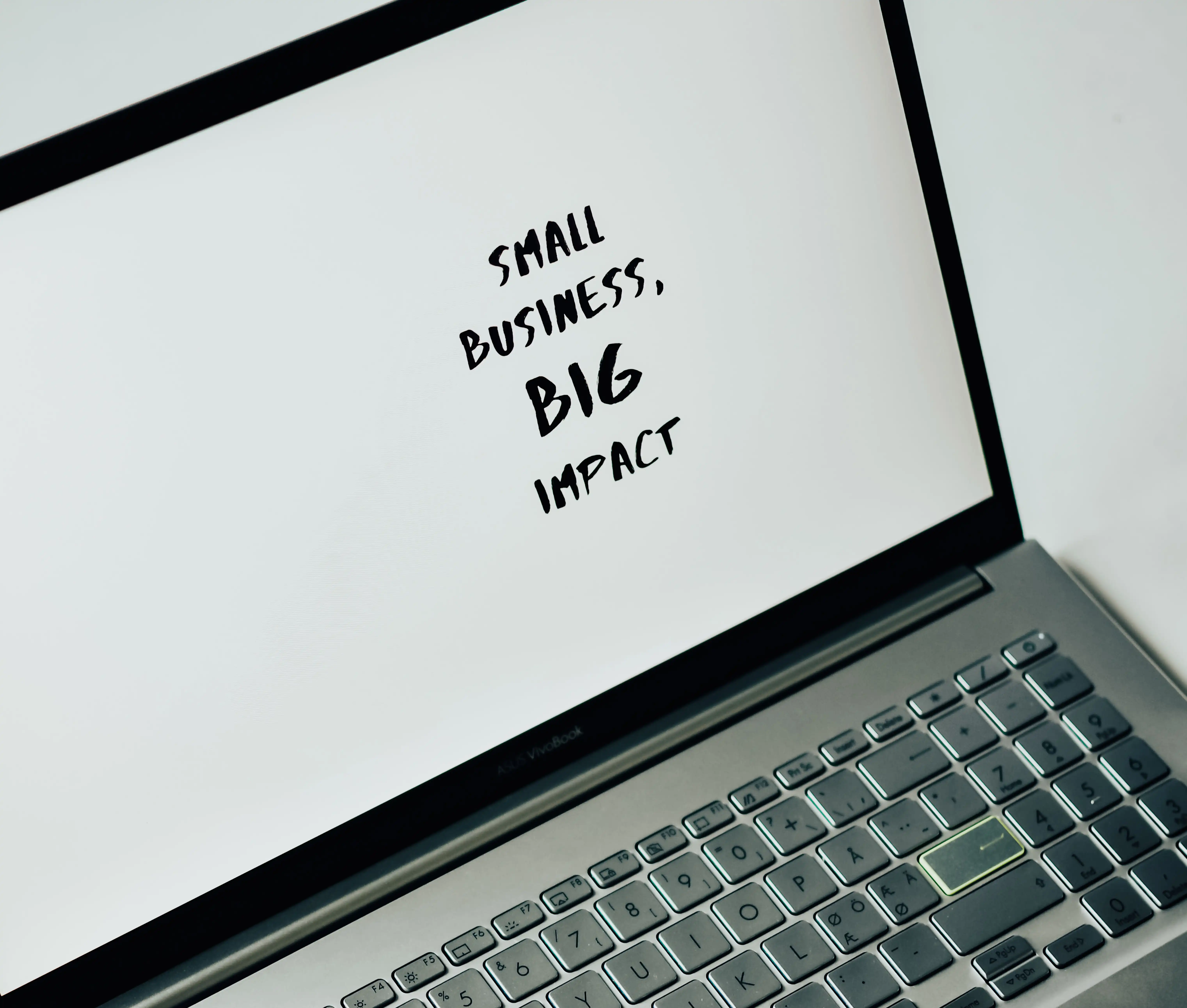 laptop that says small business big impact