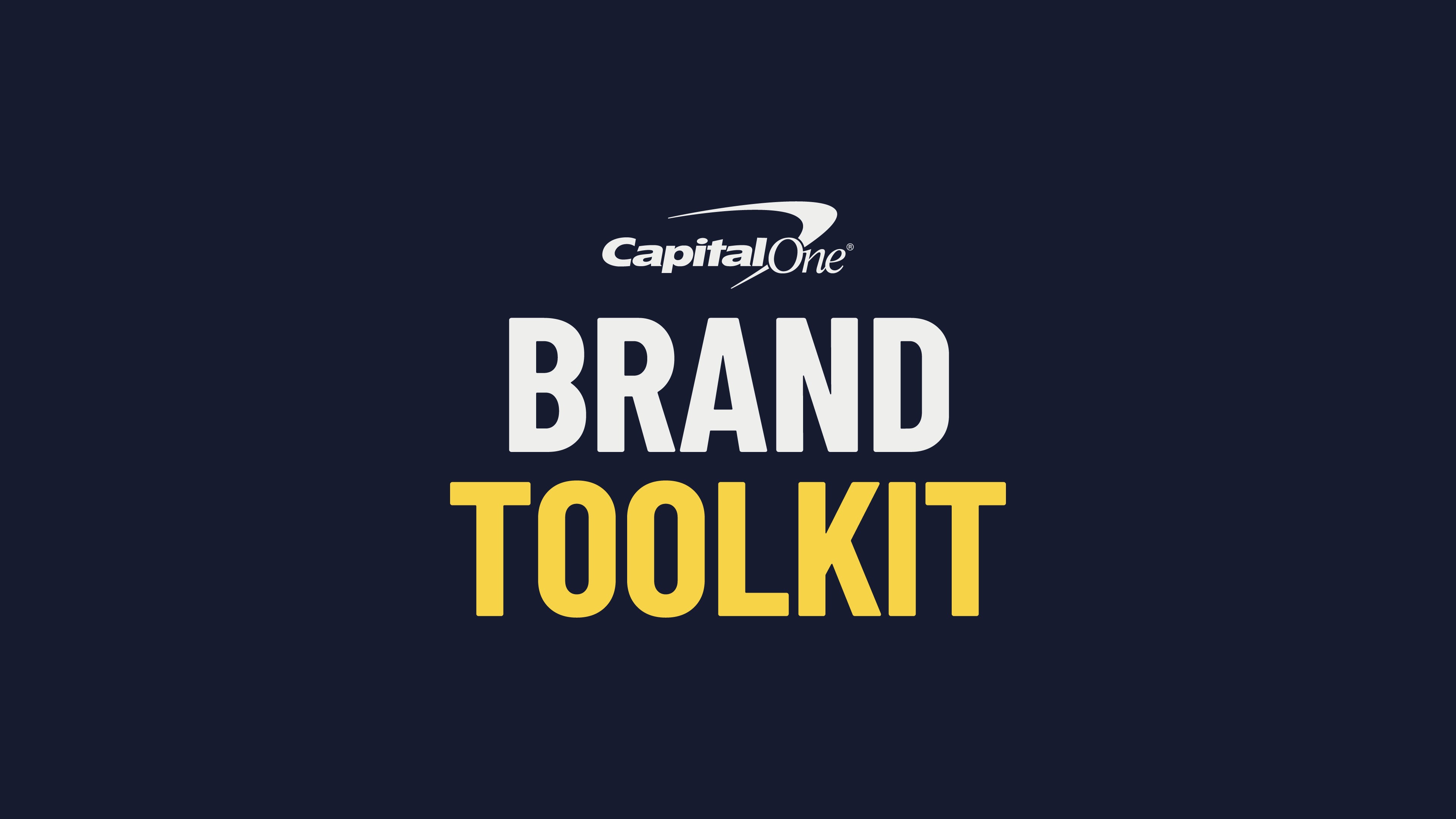 Modern home office setup with a monitor, ergonomic chair, keyboard, and indoor plants near a window with blinds.