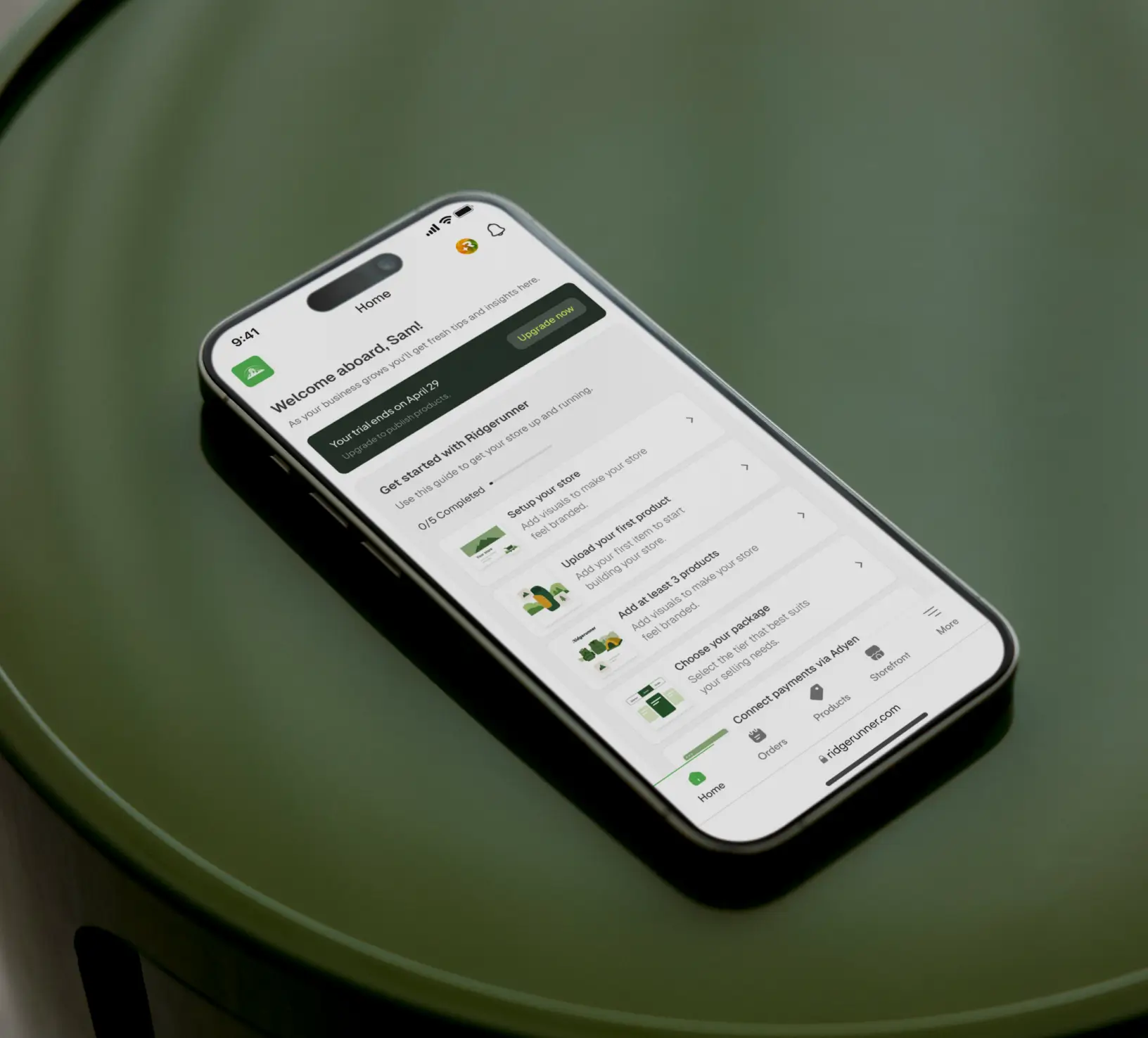 Modern iPhone sitting on a green table